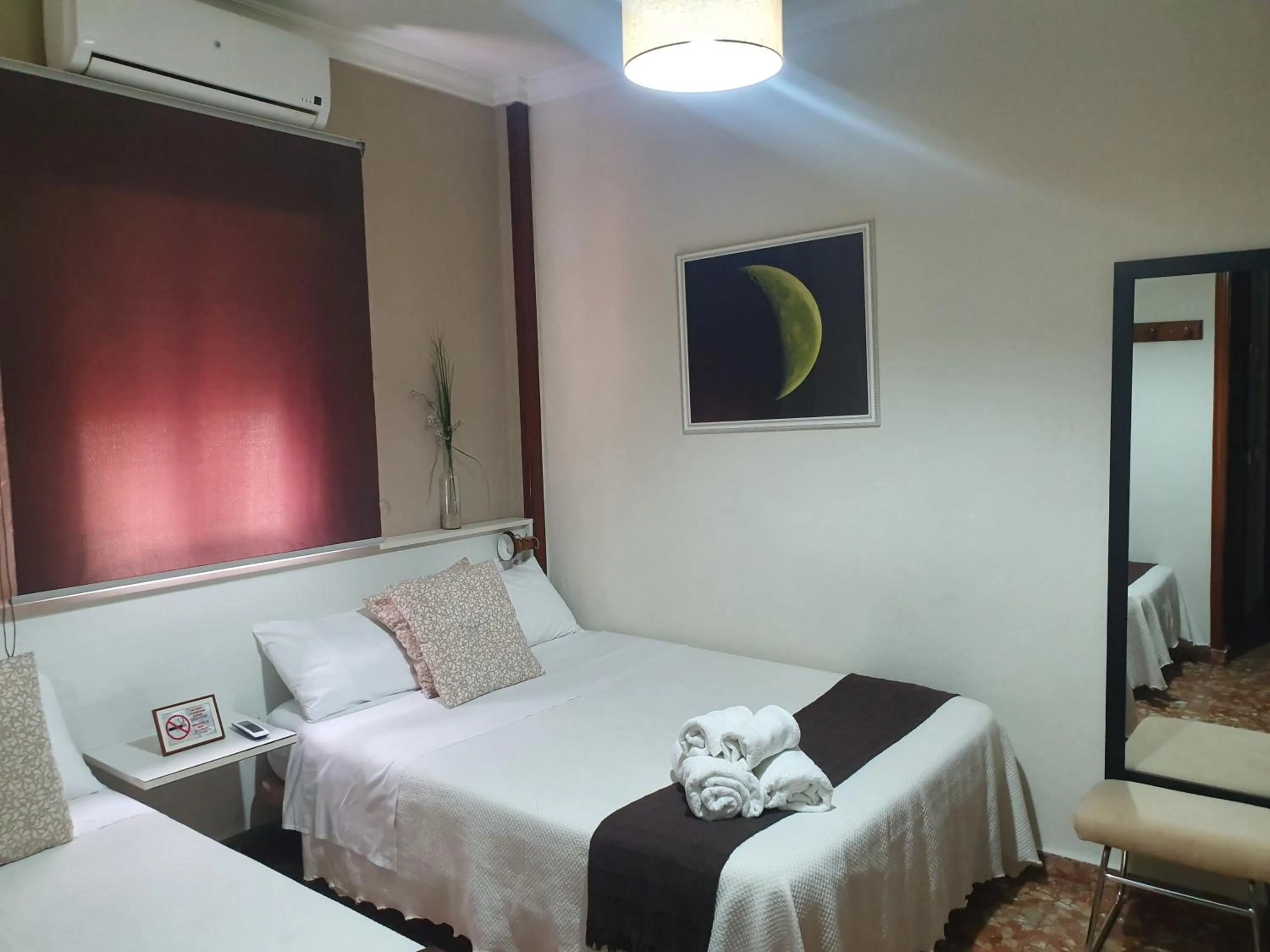Bed in LUNA-Guest Rooms