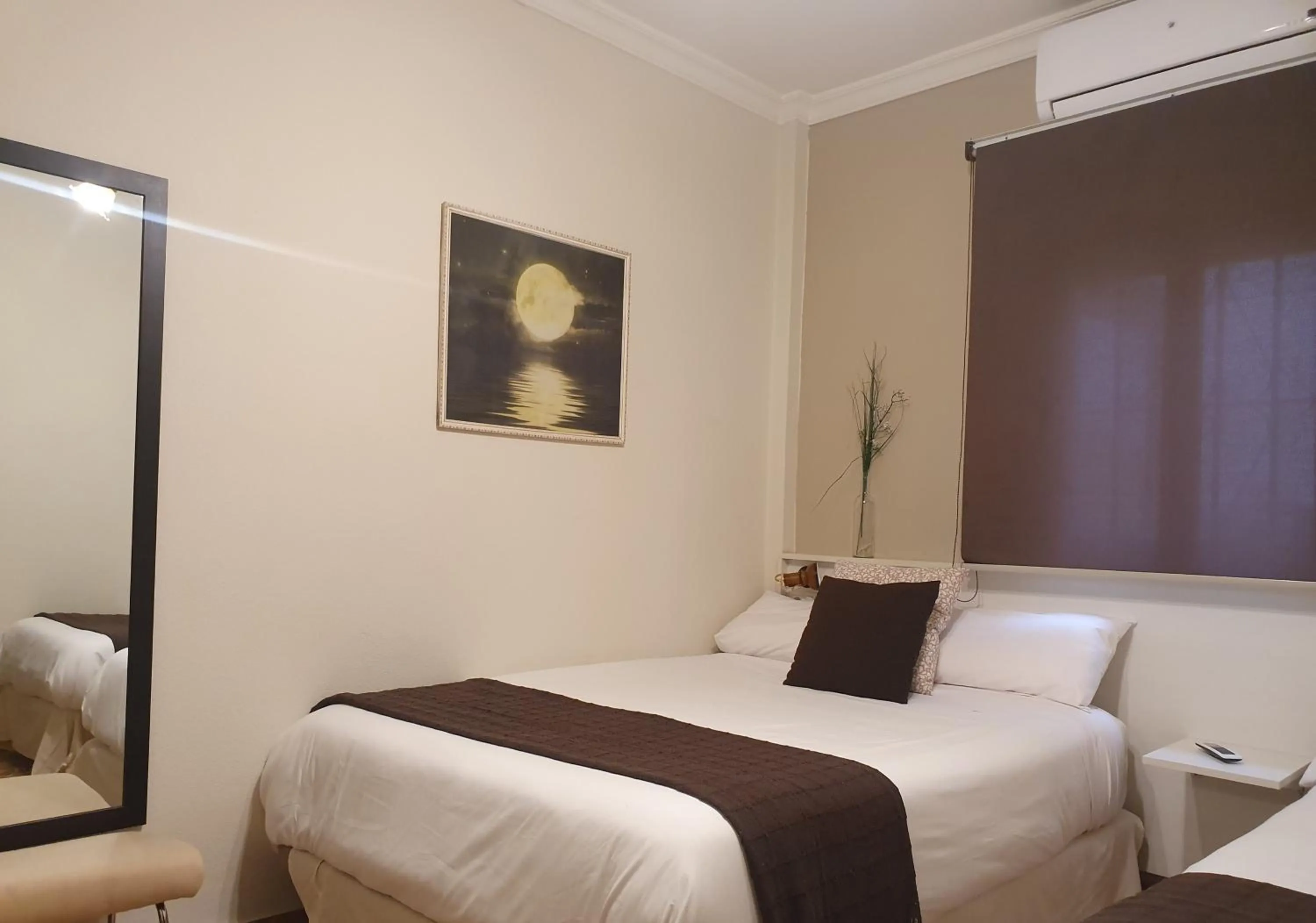 Bed in LUNA-Guest Rooms