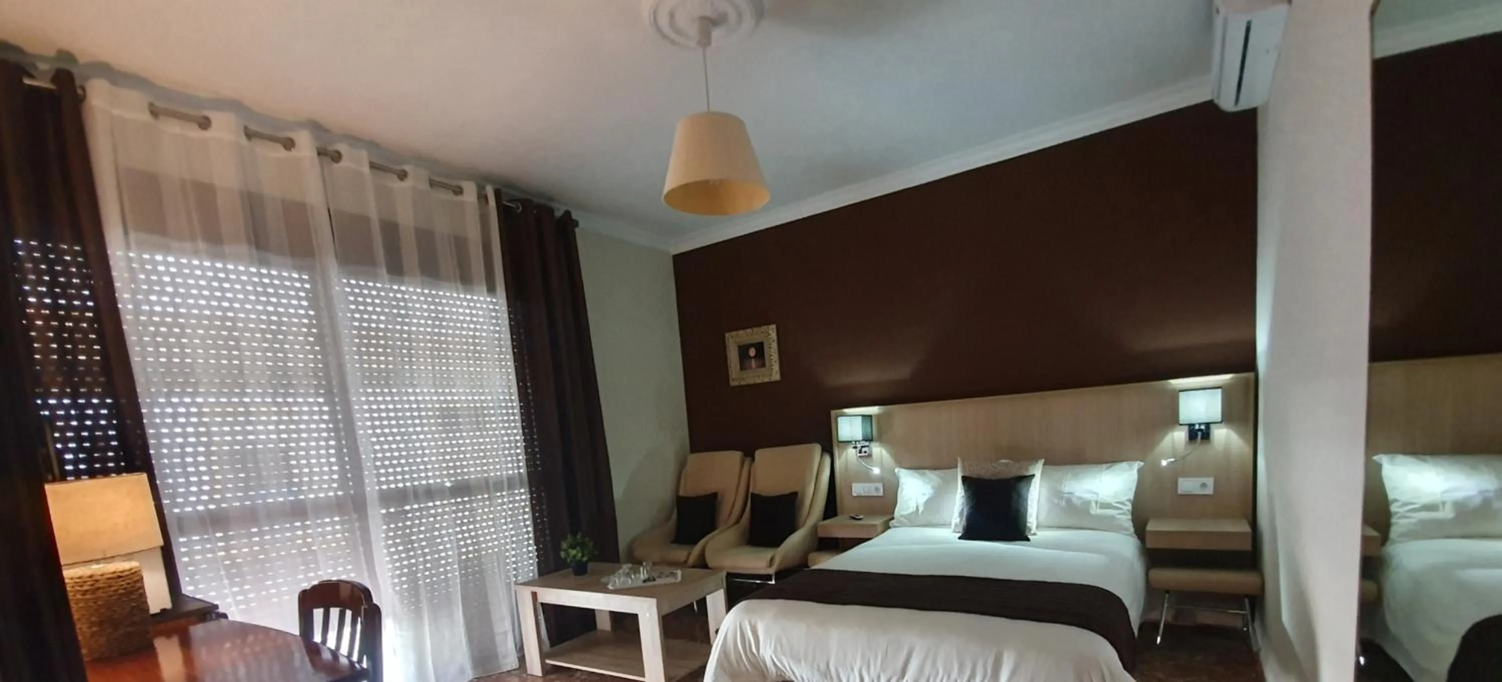 Bed in LUNA-Guest Rooms