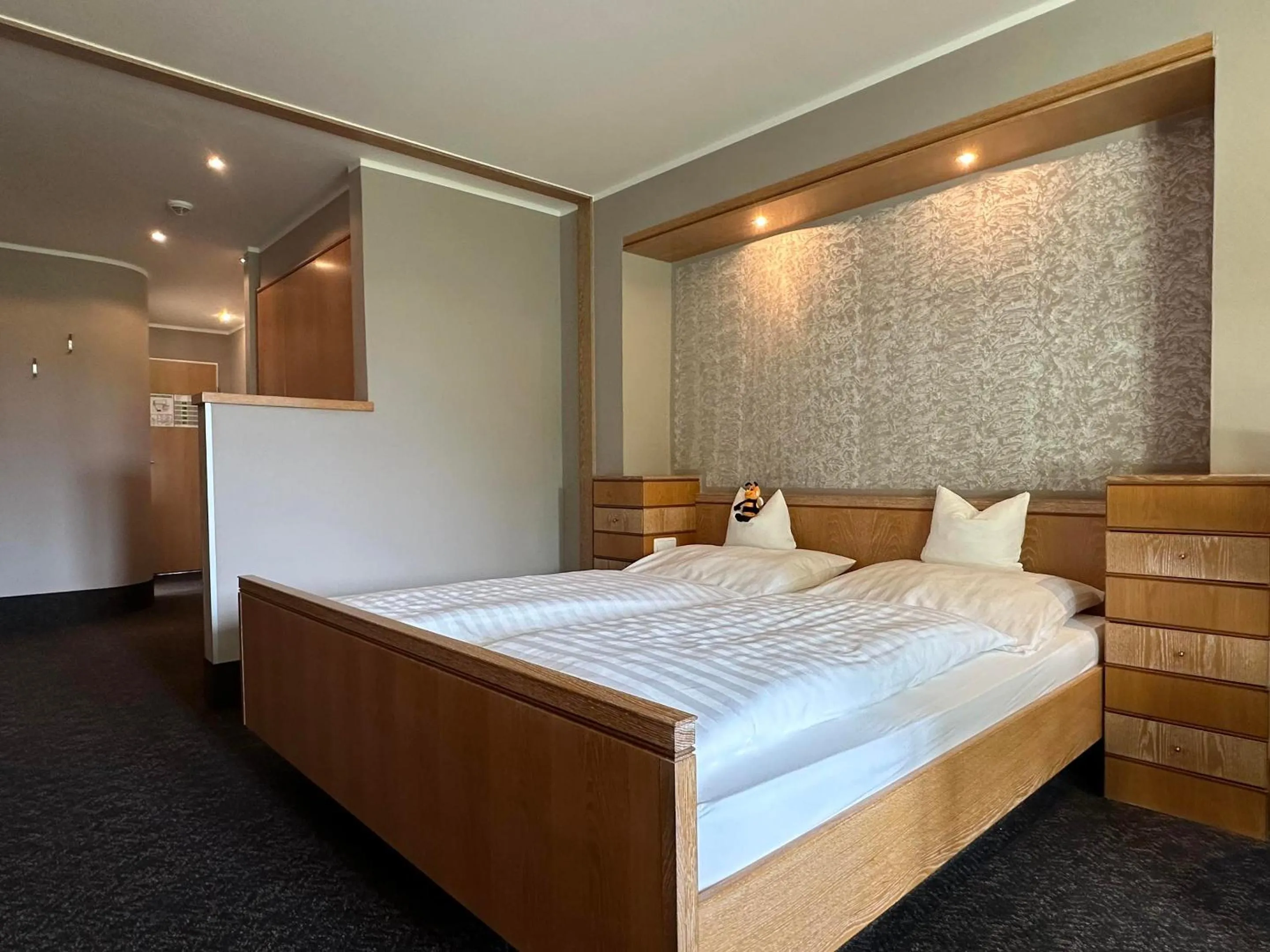 Bed in Köhlers Forsthaus Wellness & Genuss Hotel