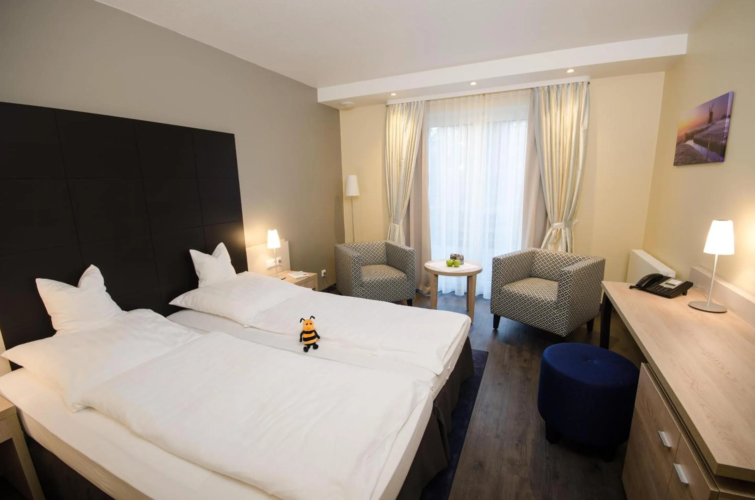 Bed in Köhlers Forsthaus Wellness & Genuss Hotel