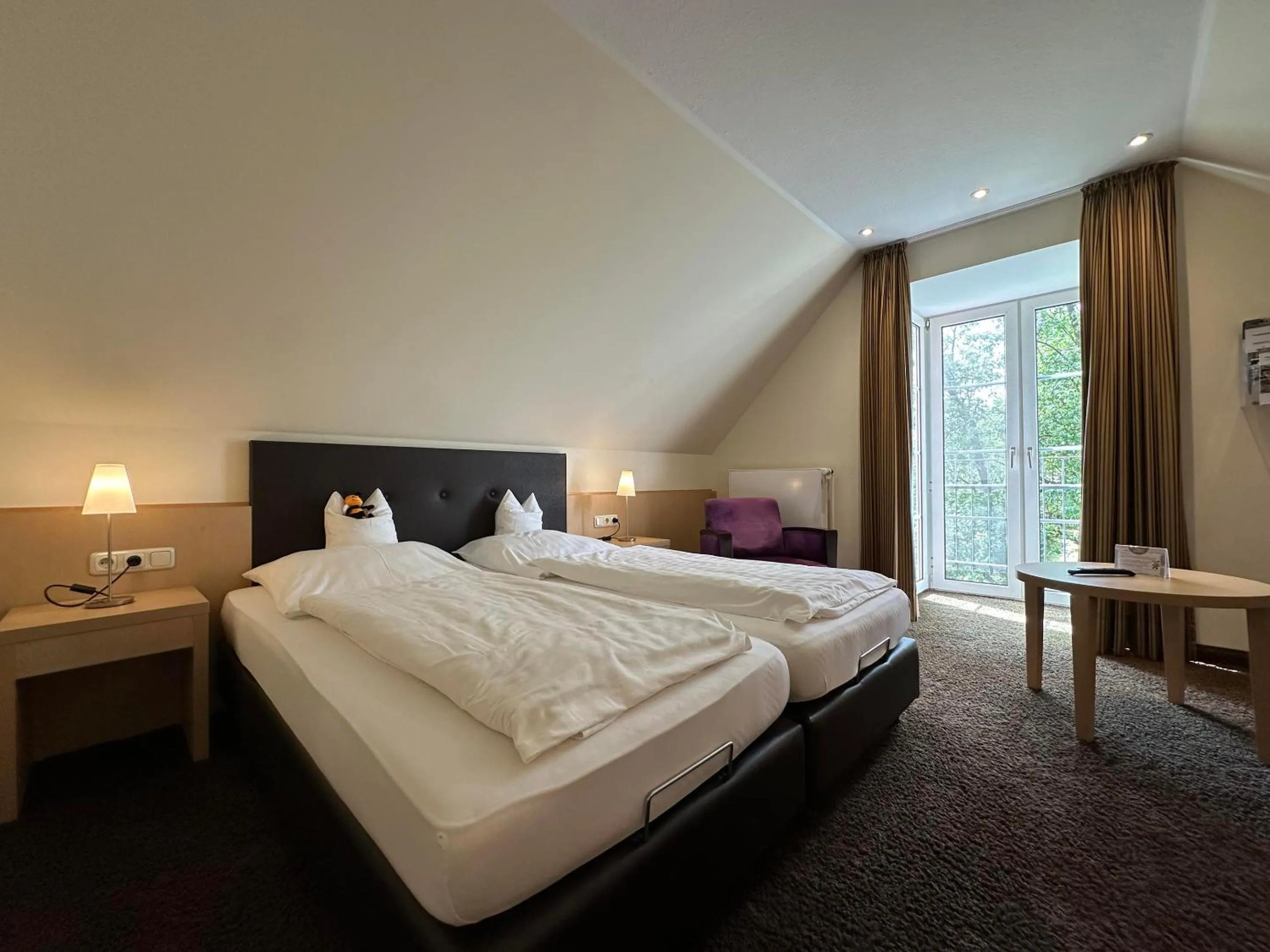 Bed in Köhlers Forsthaus Wellness & Genuss Hotel