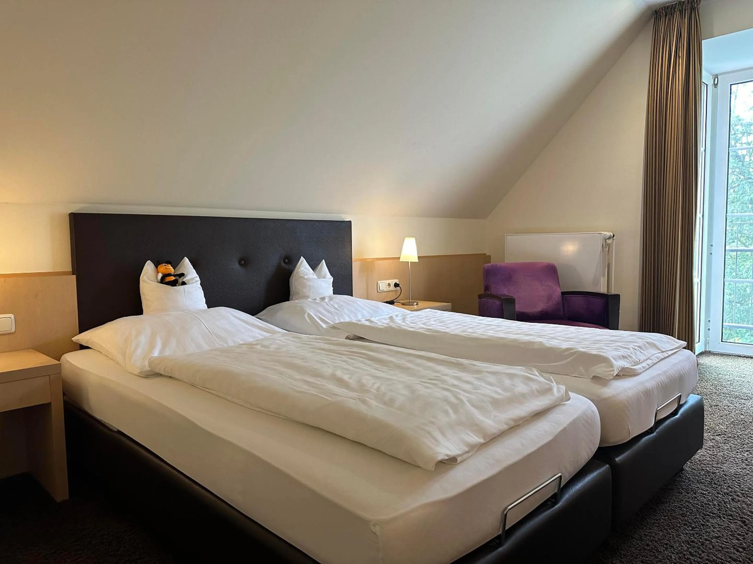 Bed in Köhlers Forsthaus Wellness & Genuss Hotel