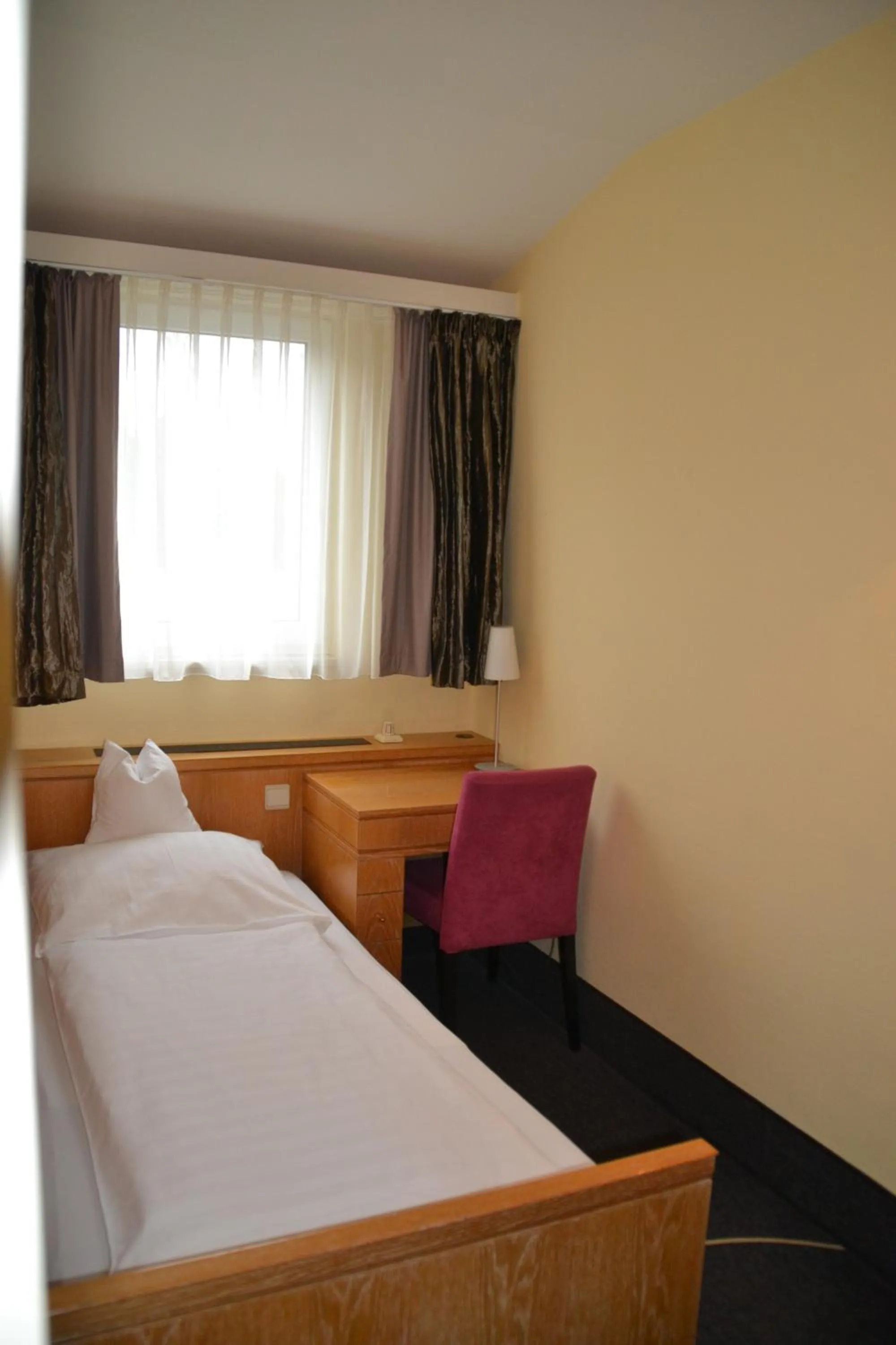 Bed in Köhlers Forsthaus Wellness & Genuss Hotel