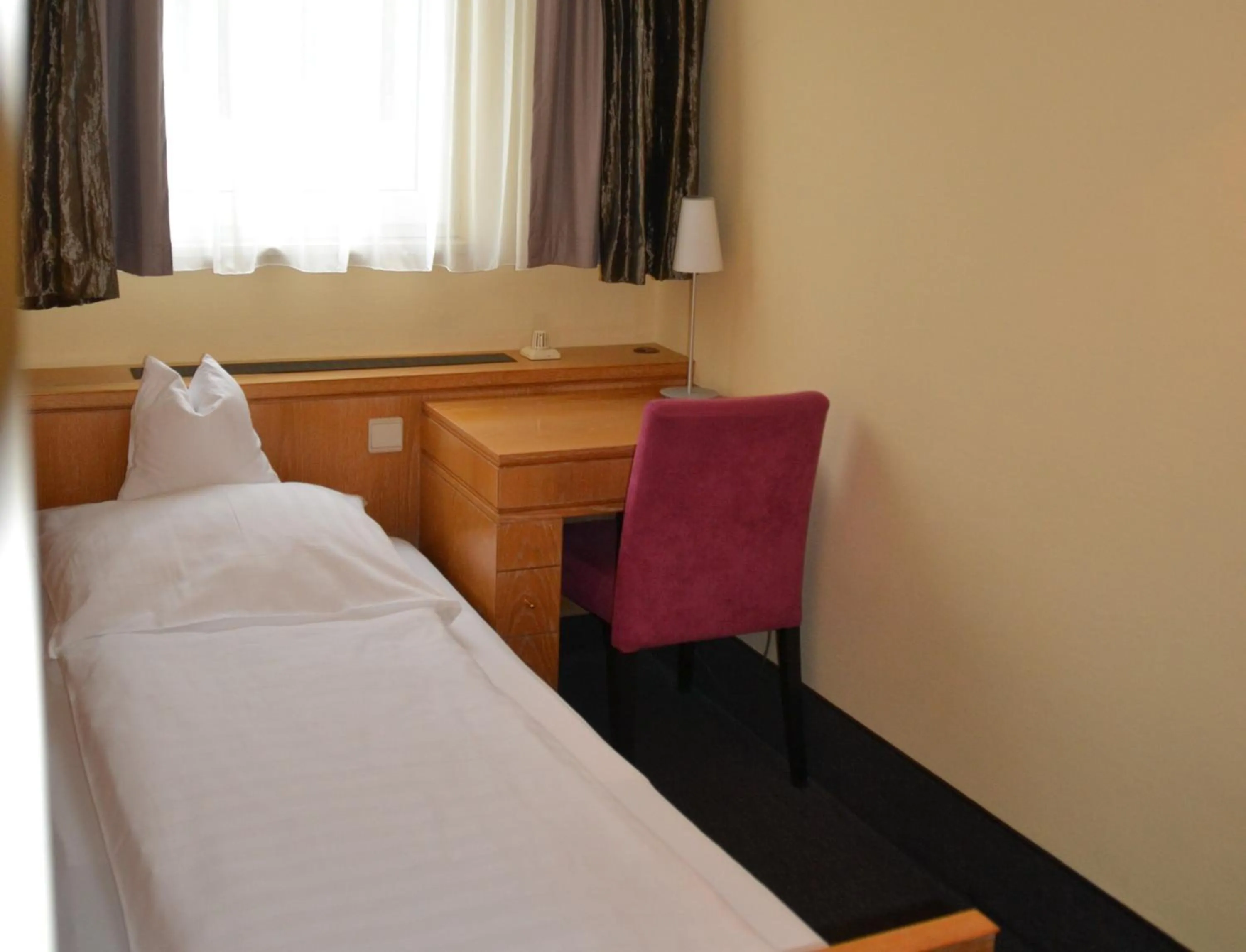 Bed in Köhlers Forsthaus Wellness & Genuss Hotel