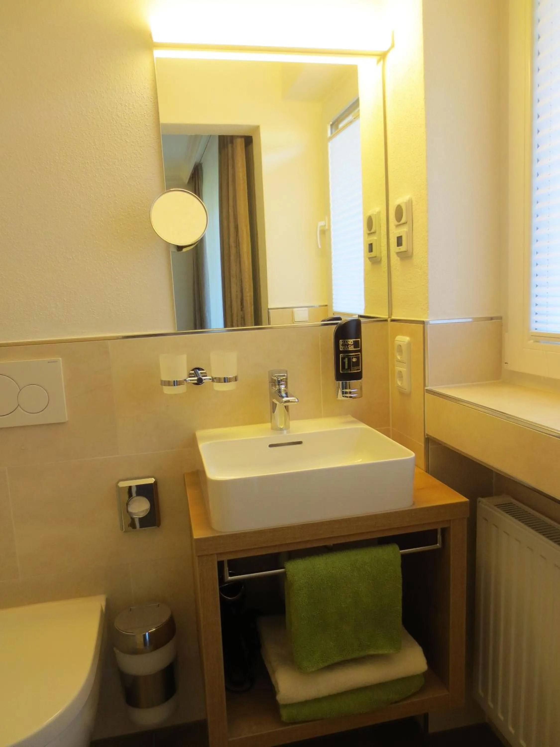 Bathroom in Hotel Alp Inn - Chiemgaukarte inclusive