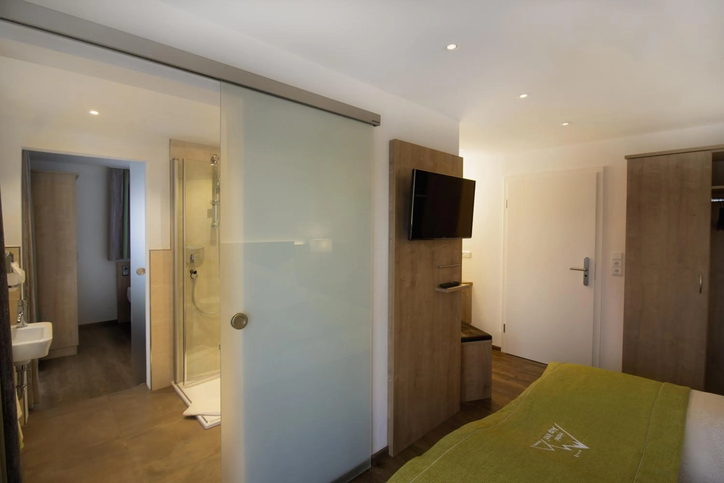 Photo of the whole room, Bed in Hotel Alp Inn - Chiemgaukarte inclusive