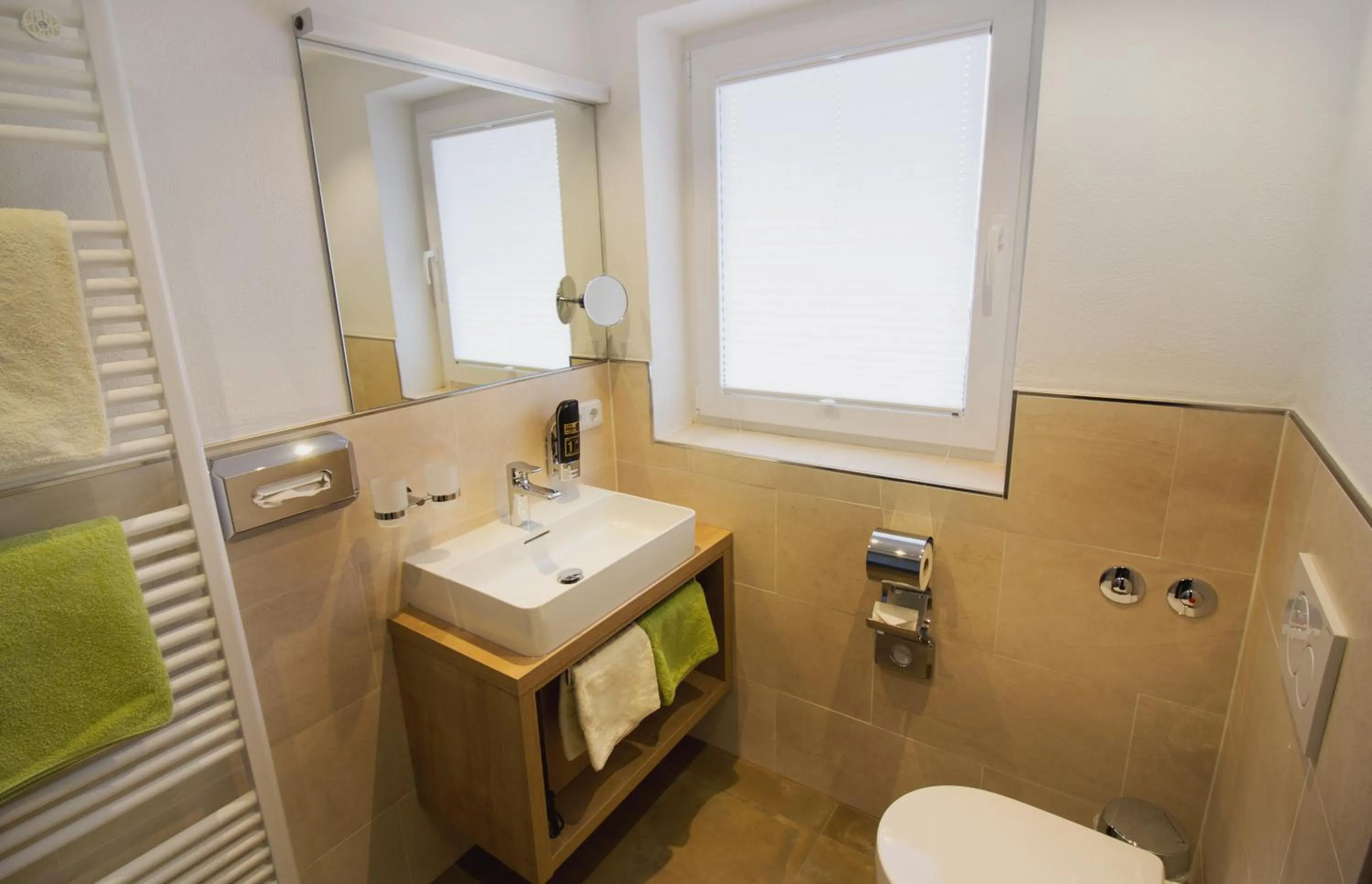 Bathroom in Hotel Alp Inn - Chiemgaukarte inclusive