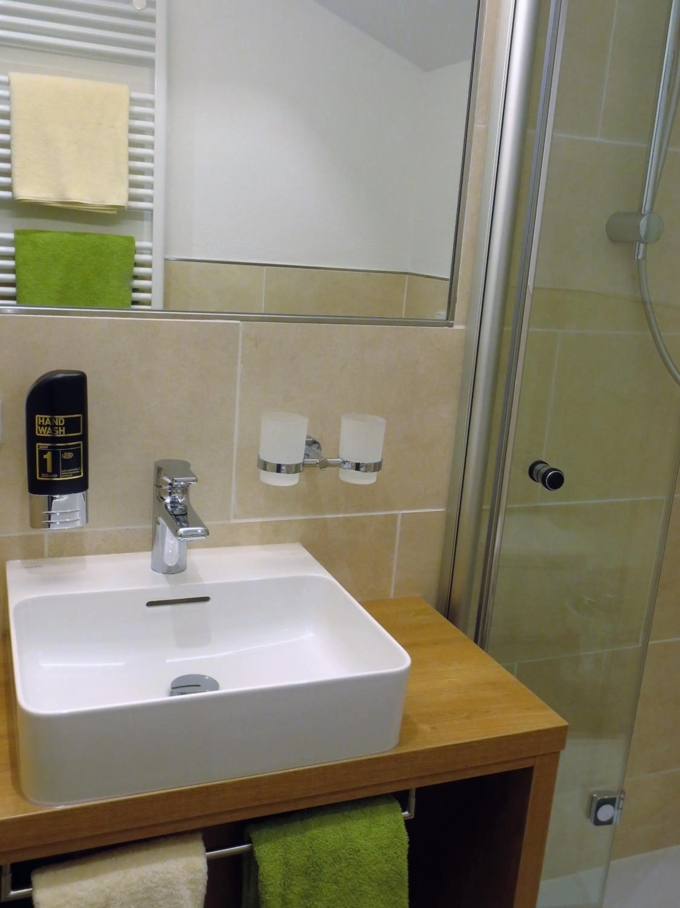 Bathroom in Hotel Alp Inn - Chiemgaukarte inclusive