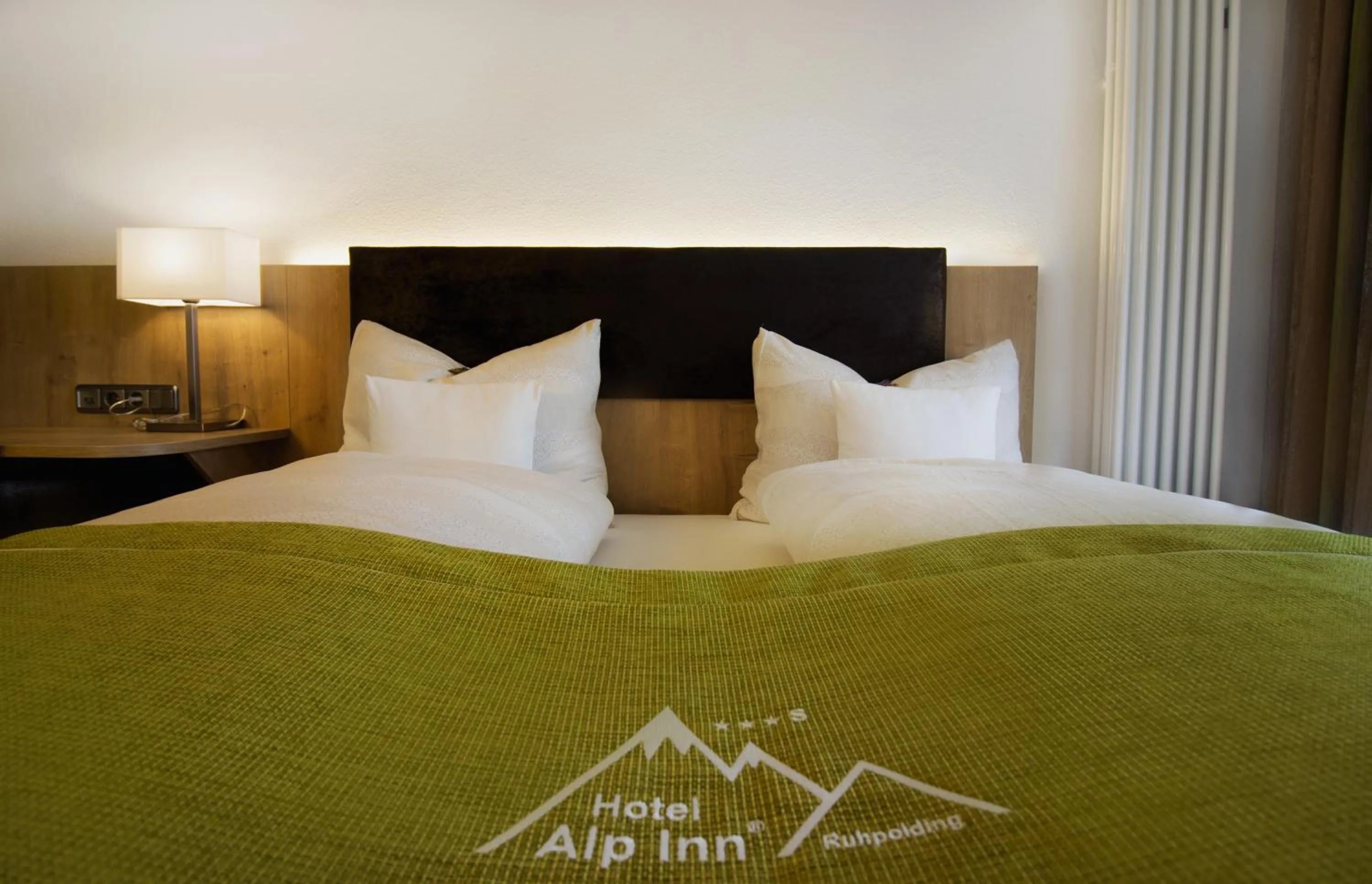 Bed in Hotel Alp Inn - Chiemgaukarte inclusive