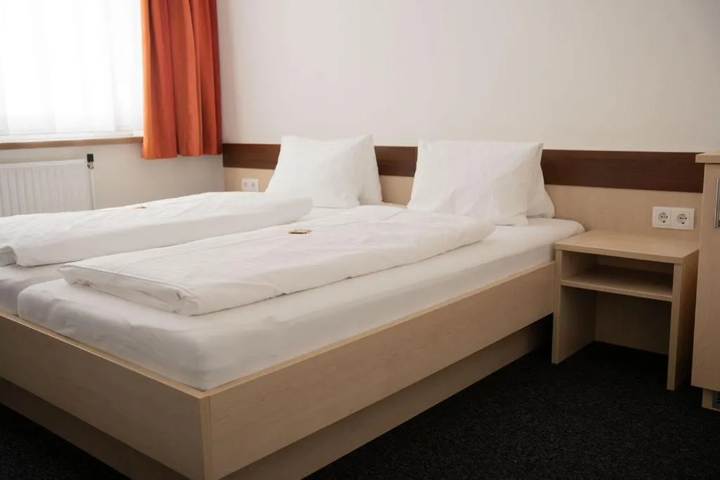 Bed in Frühstückspension Auer - Haus Kargl