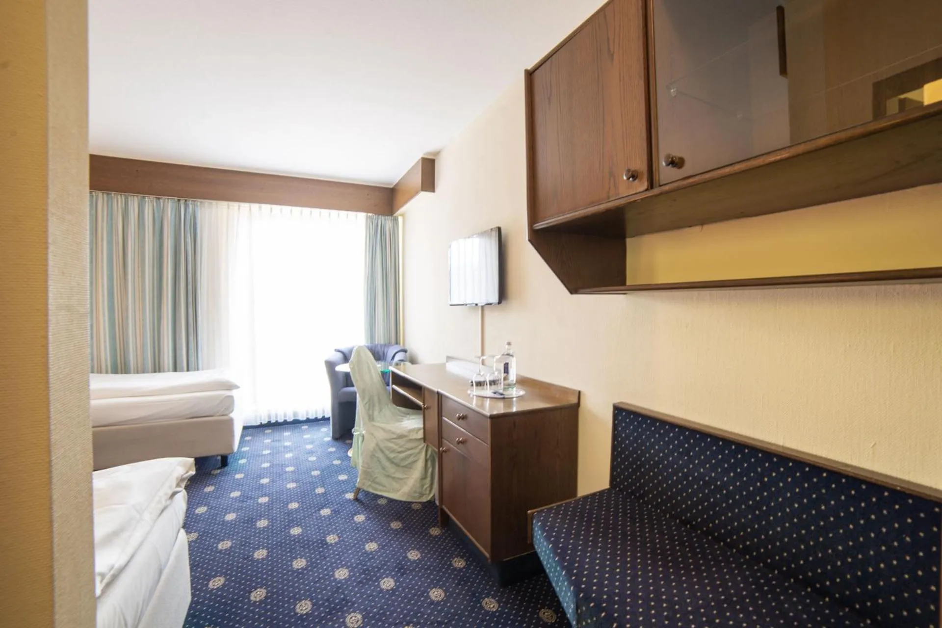 Bed in City Club Hotel