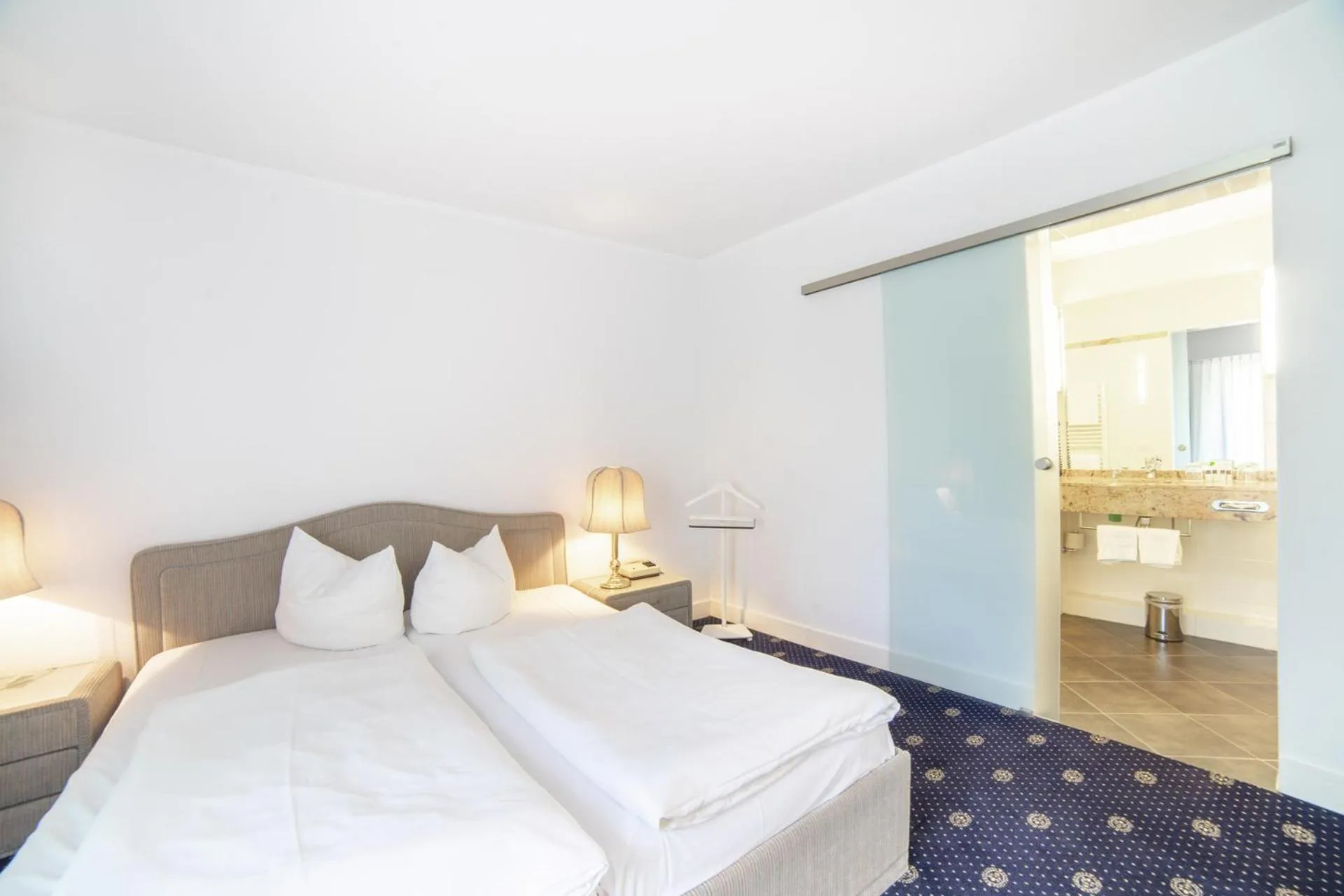 Bed in City Club Hotel