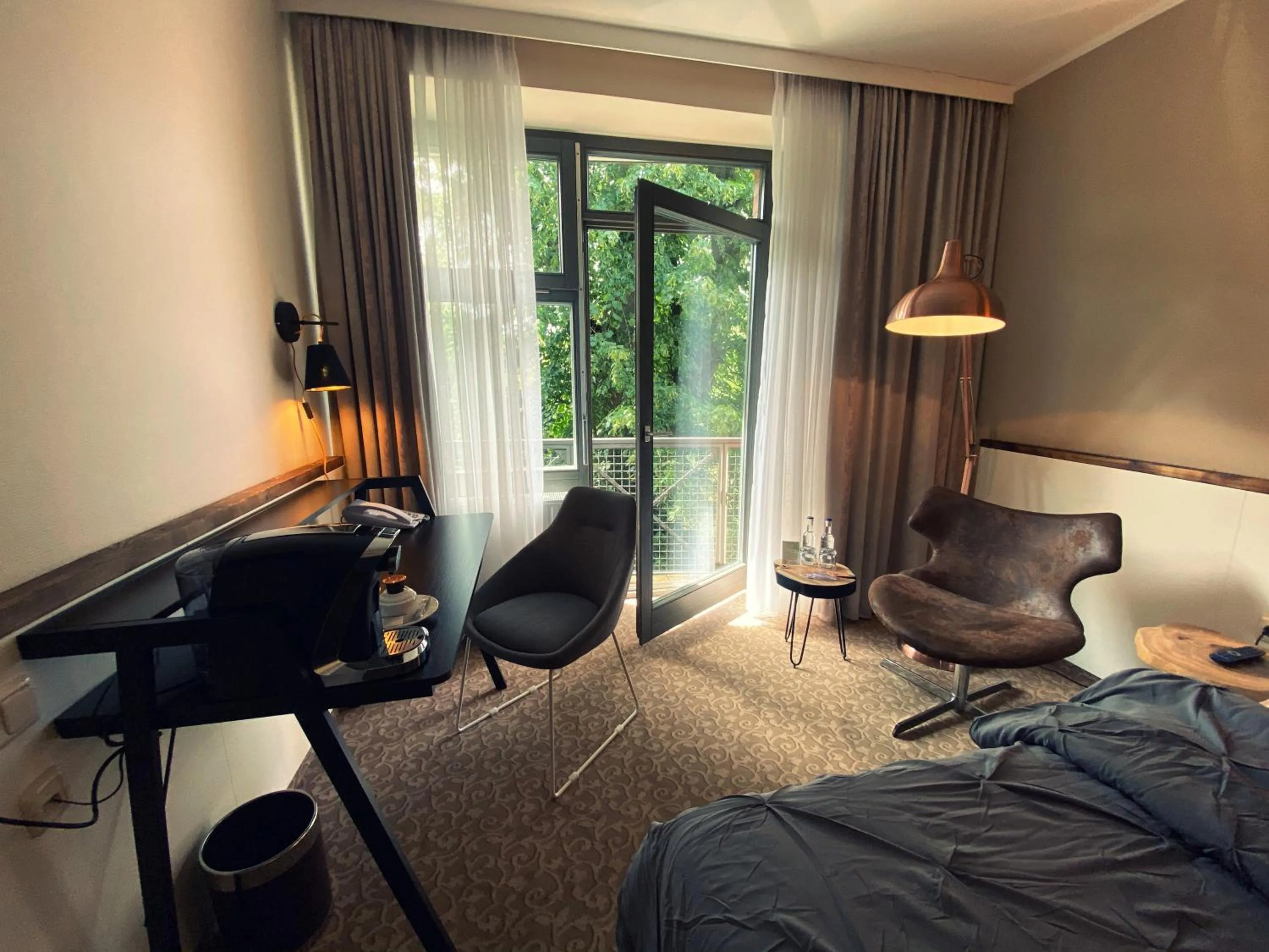 Seating area, Bed in Hotel Am Schloss Ahrensburg