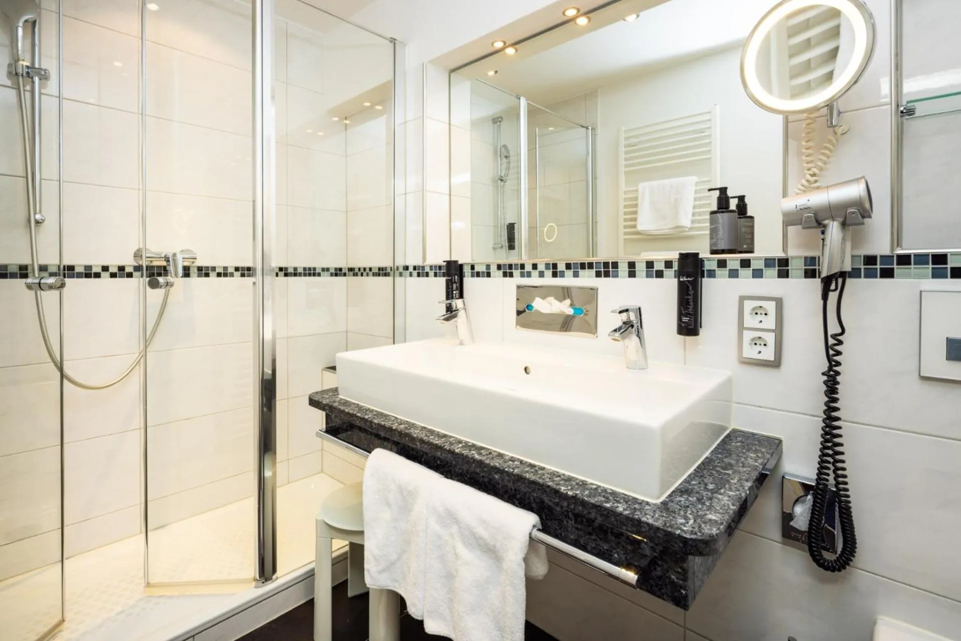 Bathroom in Alm- & Wellnesshotel Alpenhof