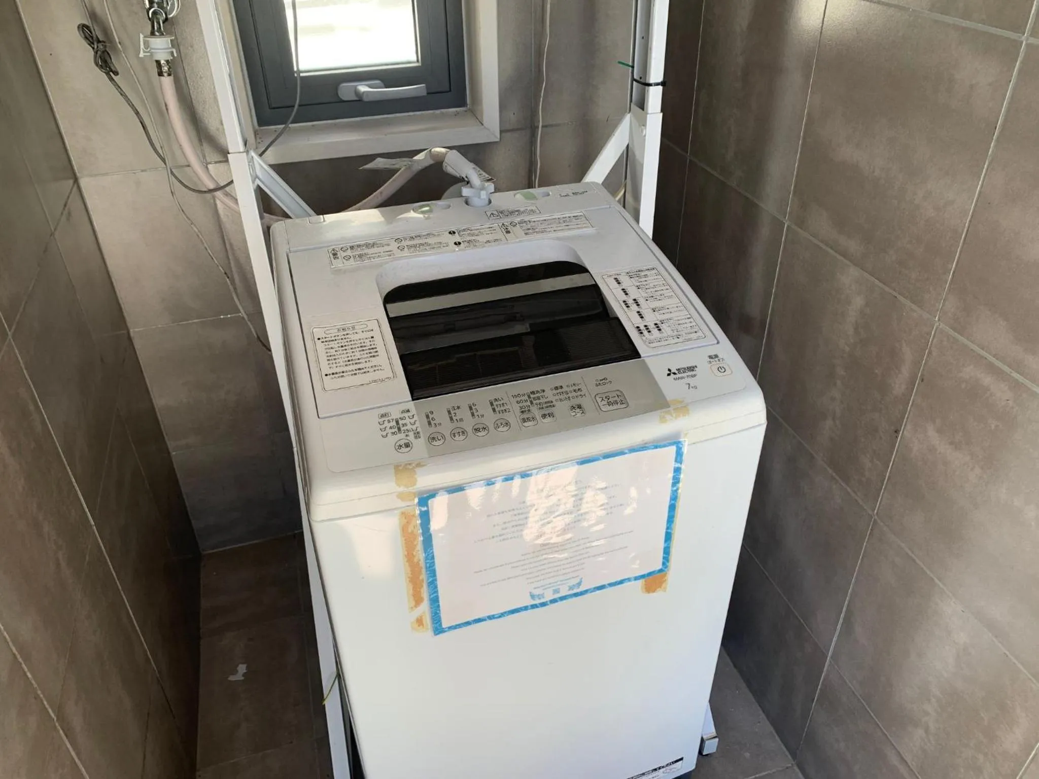 washing machine in GLORY ISLAND OKINAWA Yabusachi Resort