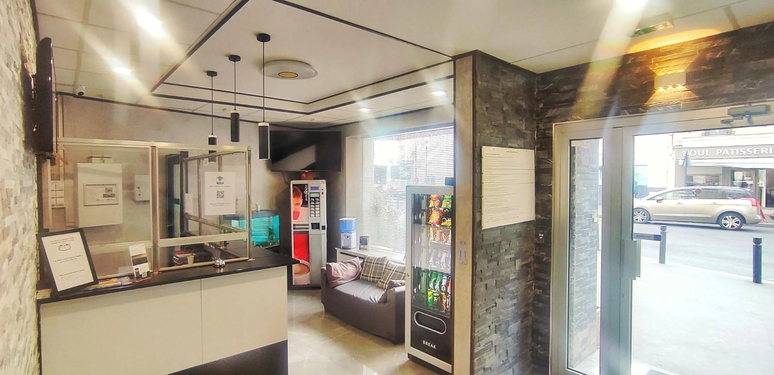 Lobby or reception in Hôtel Moderne