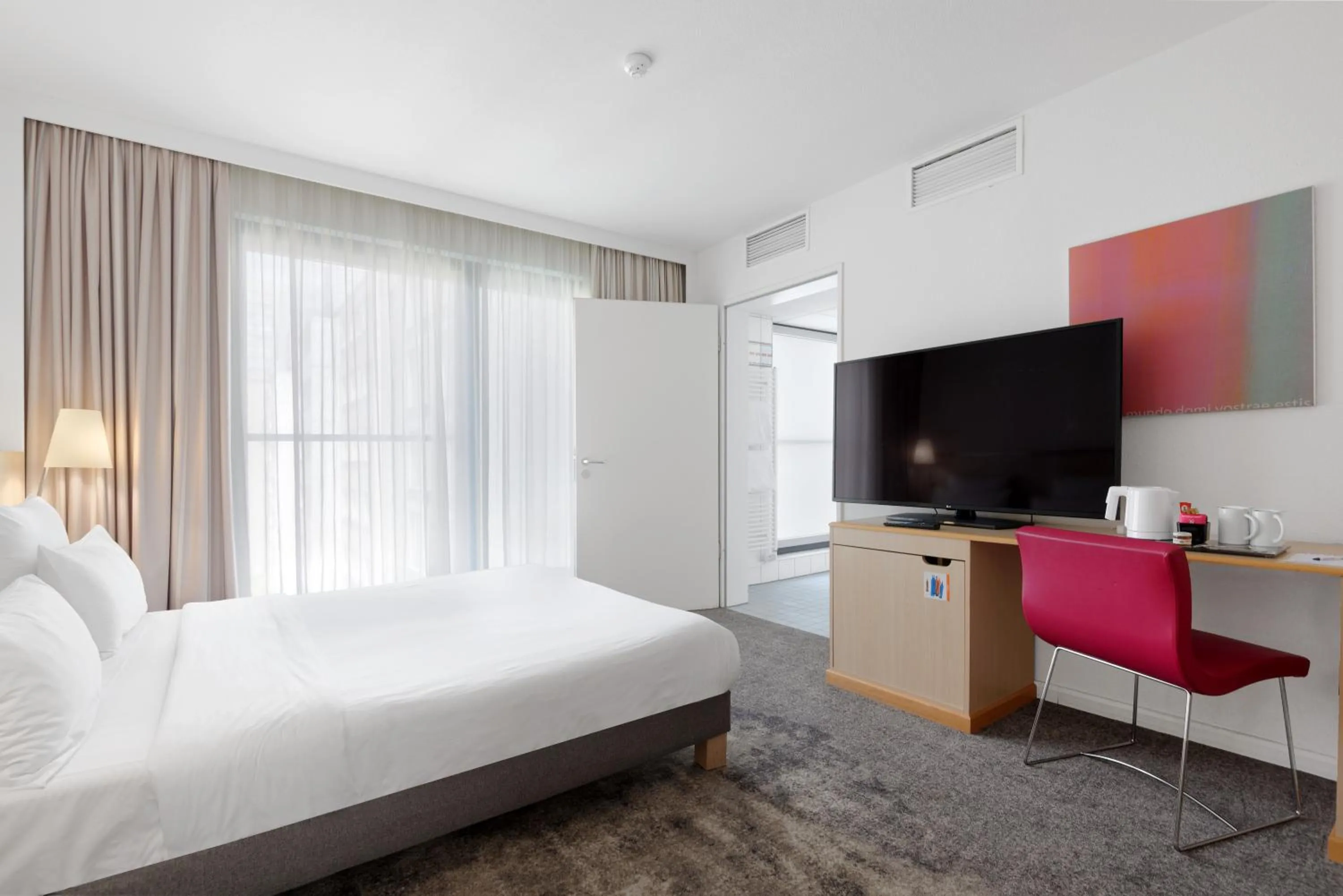 Photo of the whole room, Bed in Novotel Berlin Mitte