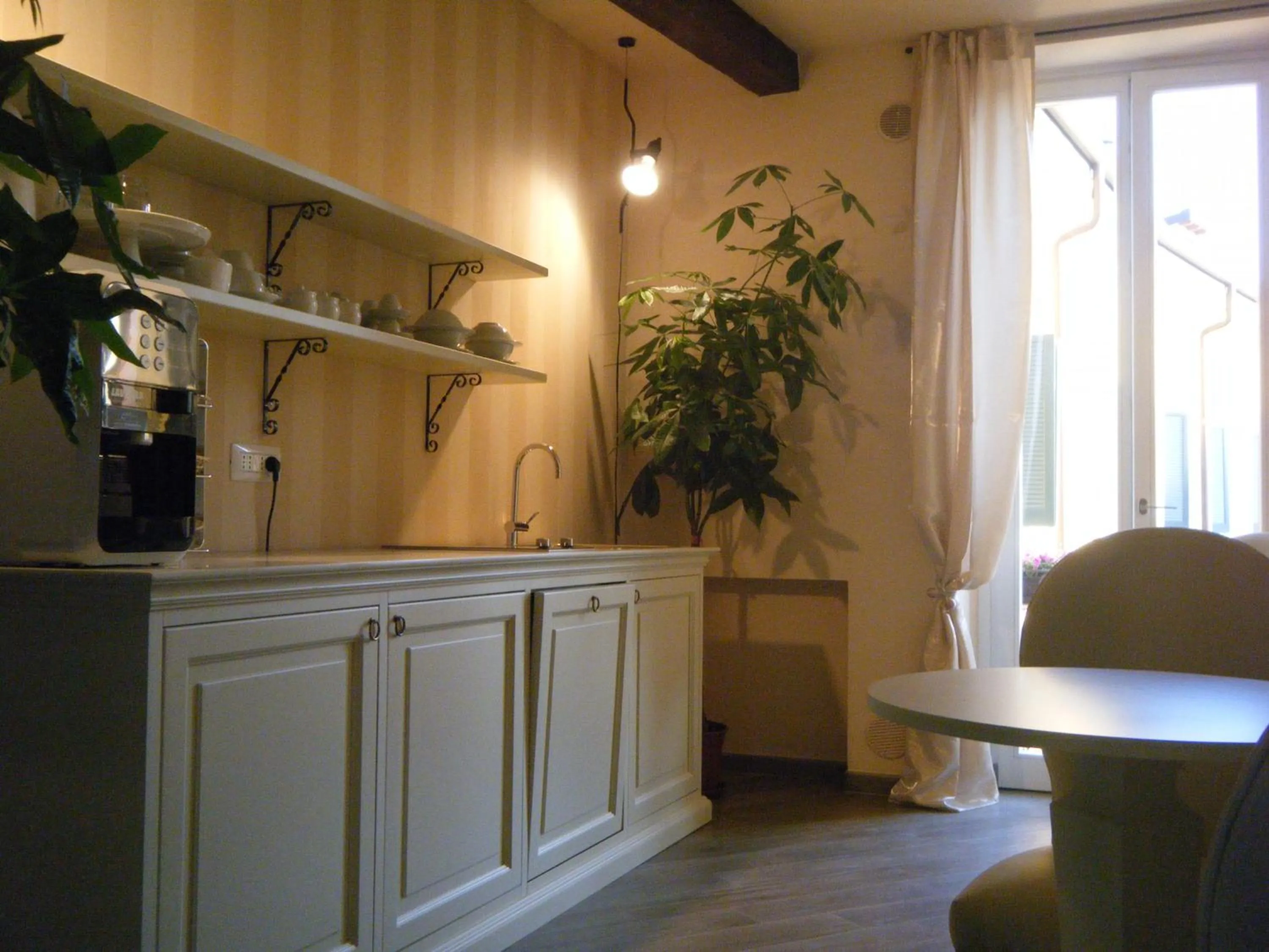 Communal lounge/ TV room in B&B Verona Centro