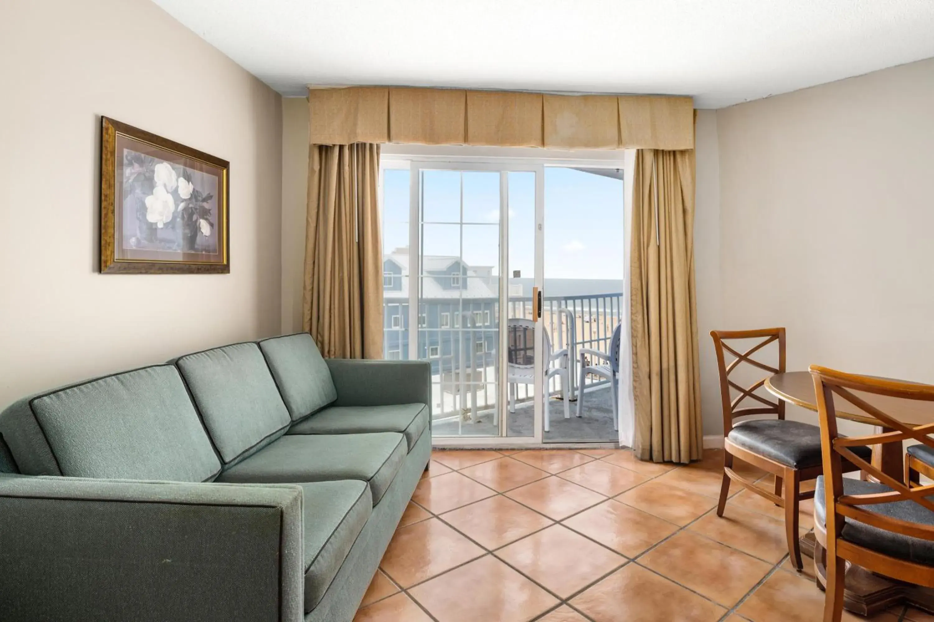 King Room with 2 King Beds & Sleep Sofa - Partial Ocean View in Tidelands Caribbean Boardwalk Hotel and Suites King Room with 2 King Beds & Sleep Sofa - Partial Ocean View in Tidelands Caribbean Boardwalk Hotel and Suites