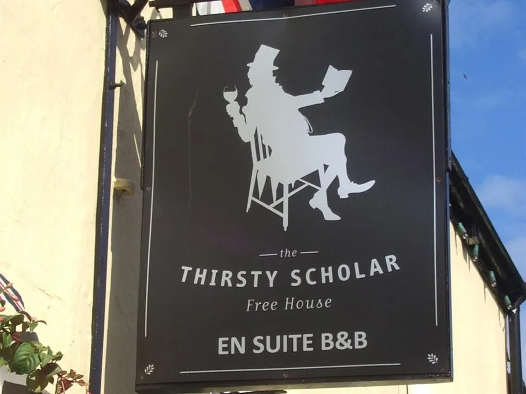 Property logo or sign in The Thirsty Scholar