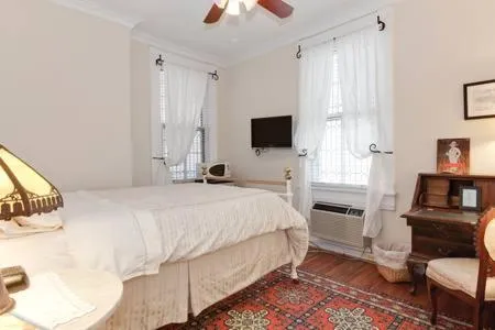 Bed in Sojourn DuPont at The Circle