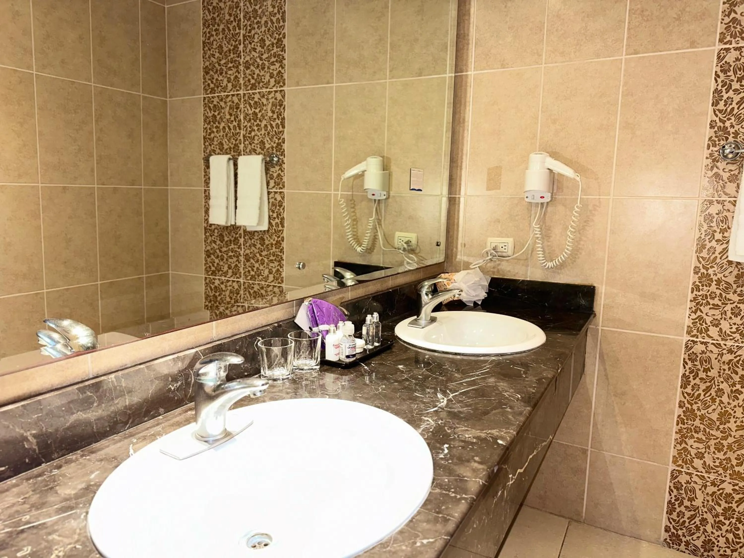 Bathroom in Ramada by Wyndham Princess Santo Domingo