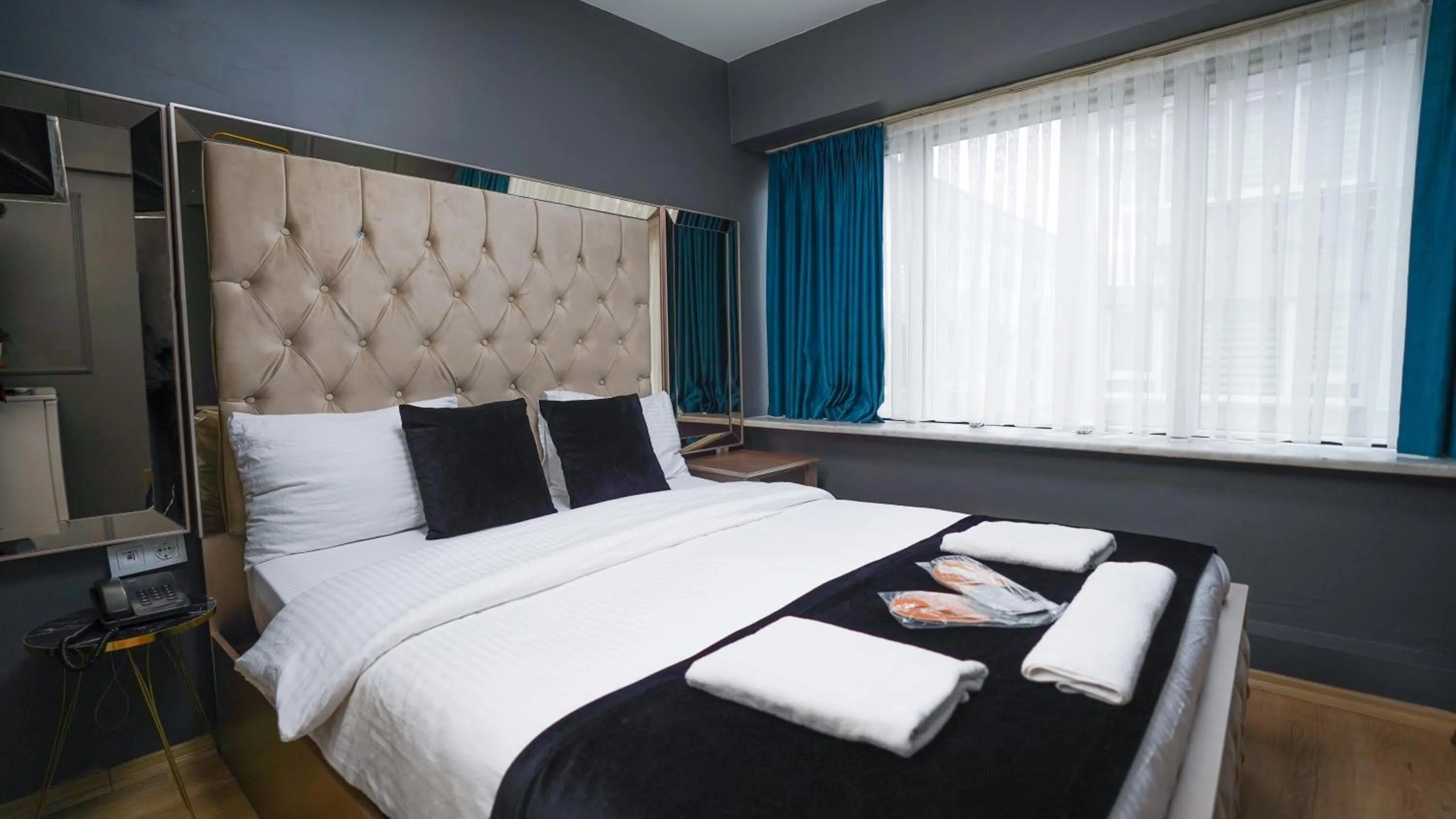 Bed in Luka Suit Hotel