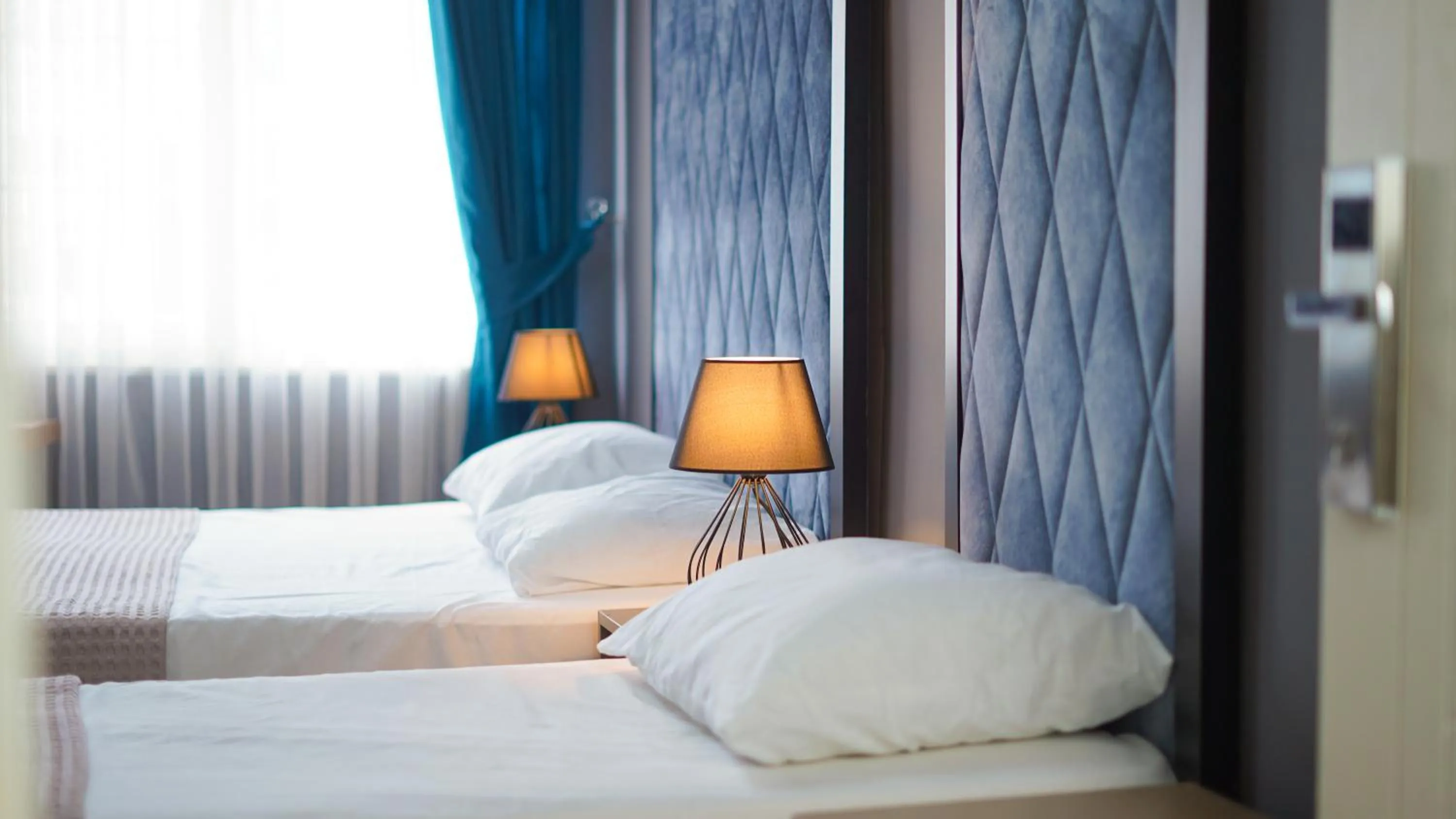 Bed in Luka Suit Hotel