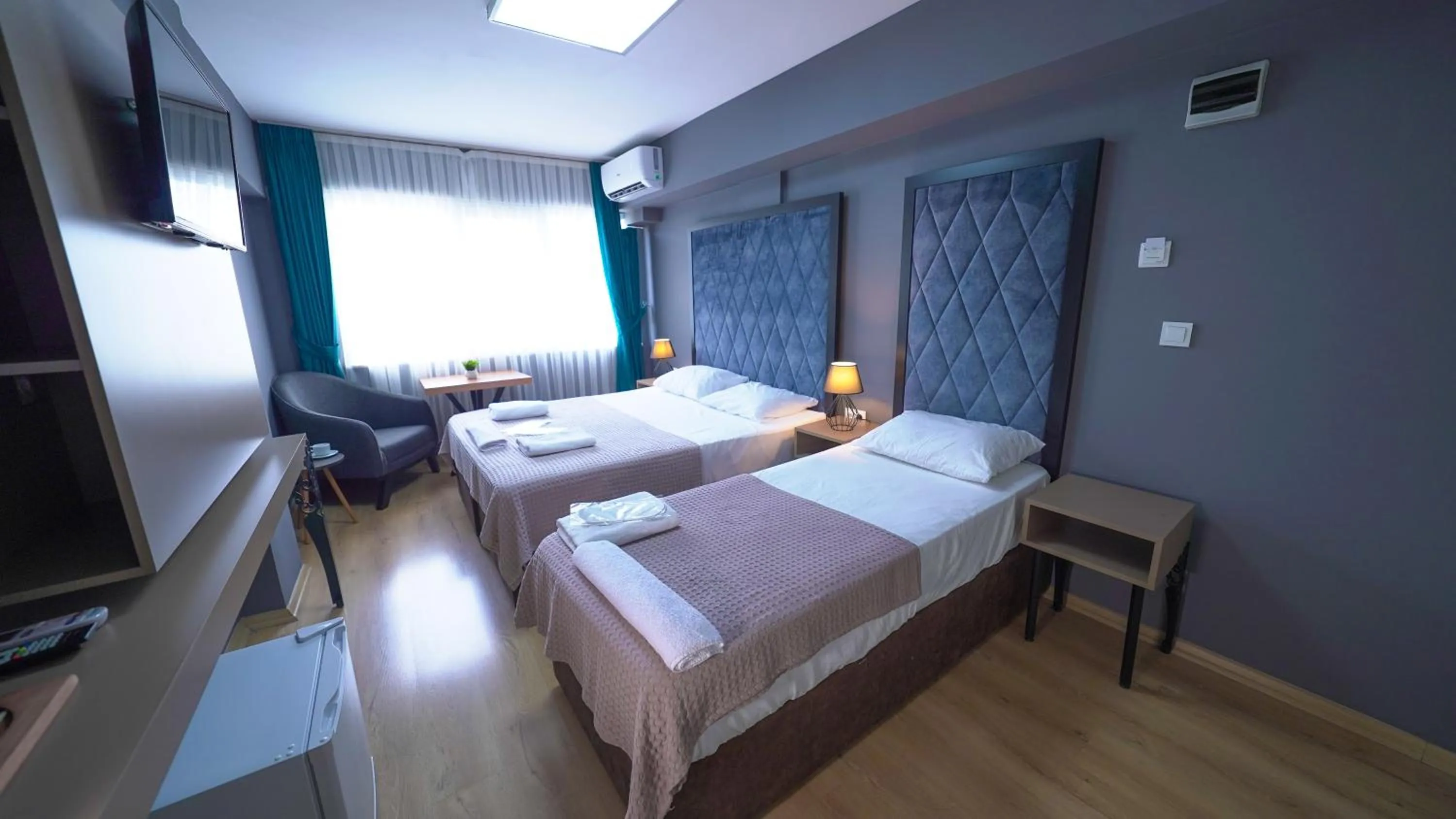 Bed in Luka Suit Hotel