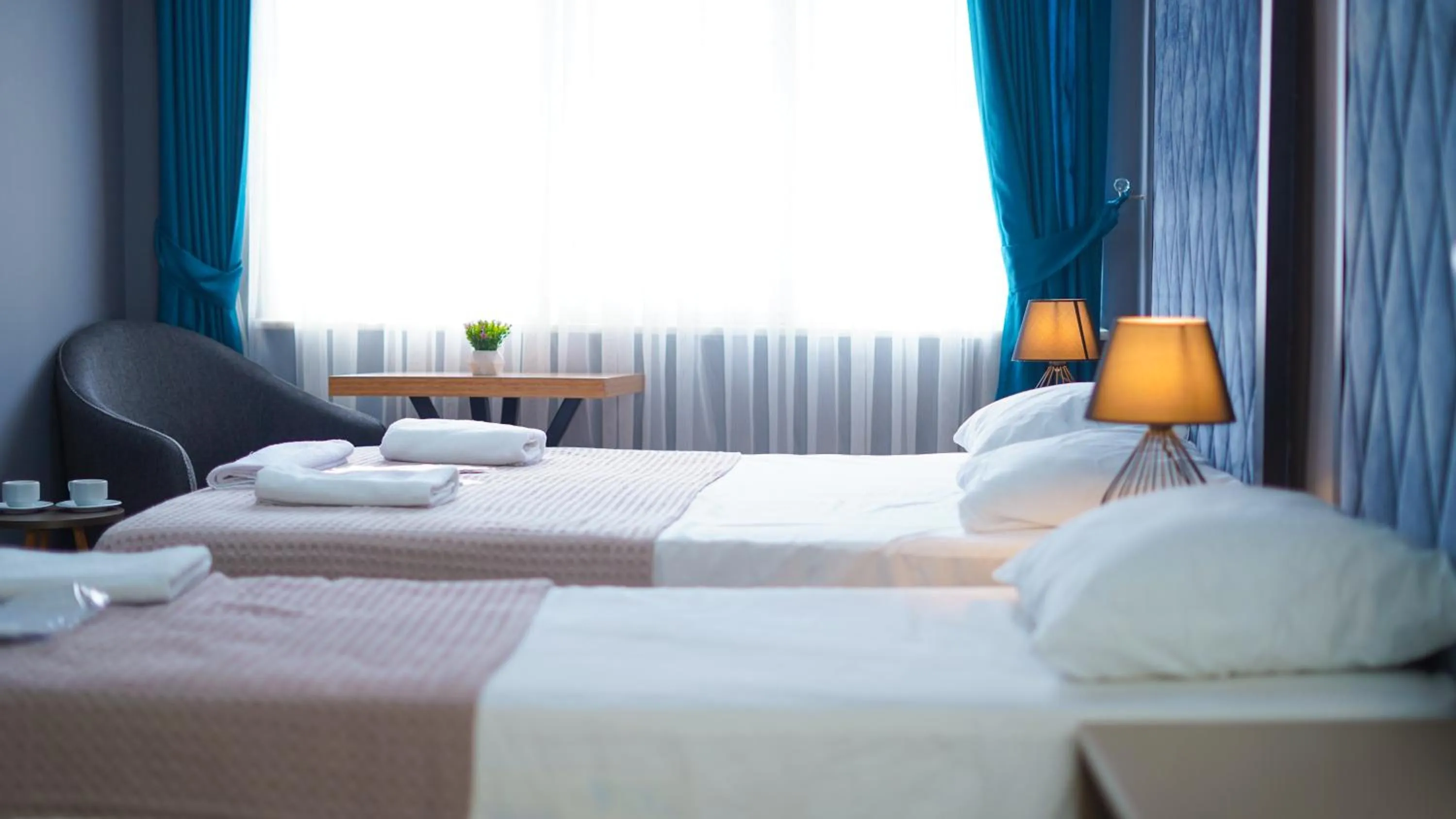 Bed in Luka Suit Hotel