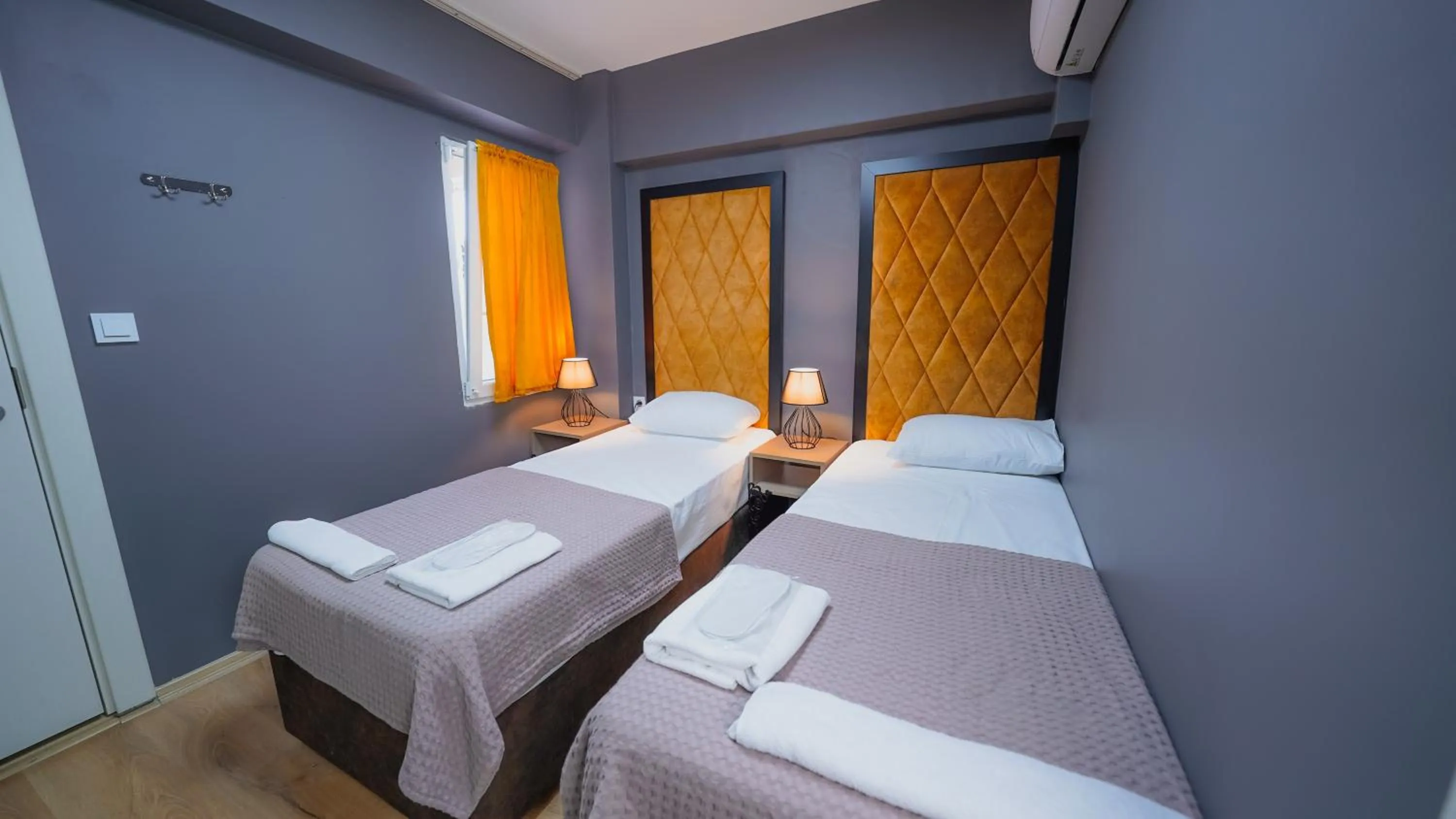 Bed in Luka Suit Hotel