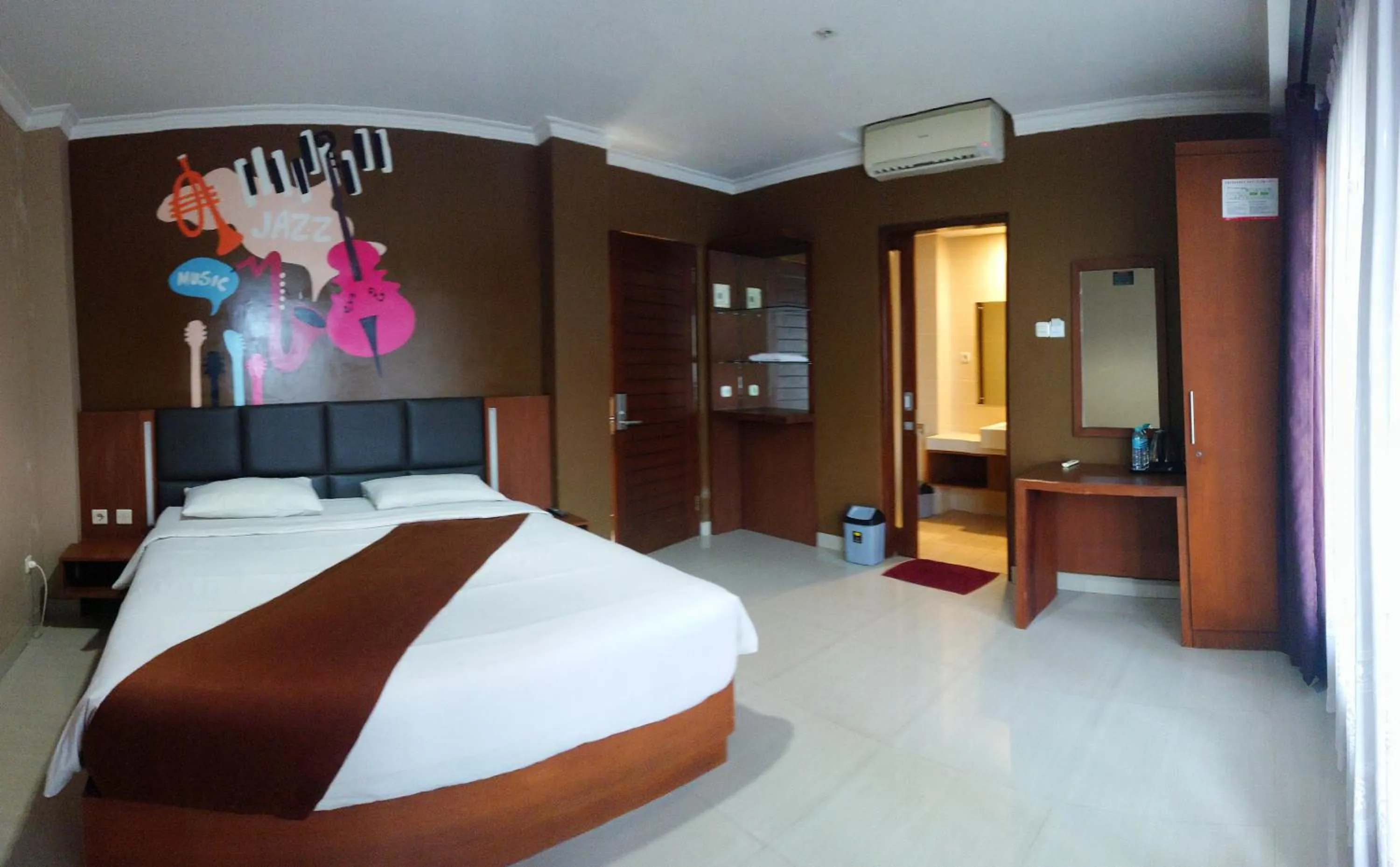 Bed in Votel Viure Hotel Jogjakarta