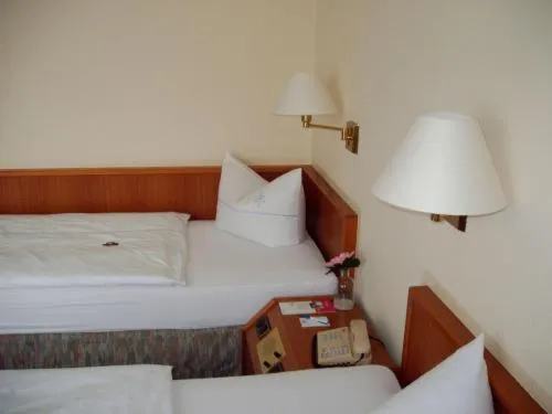 Bed in Hotel Antares