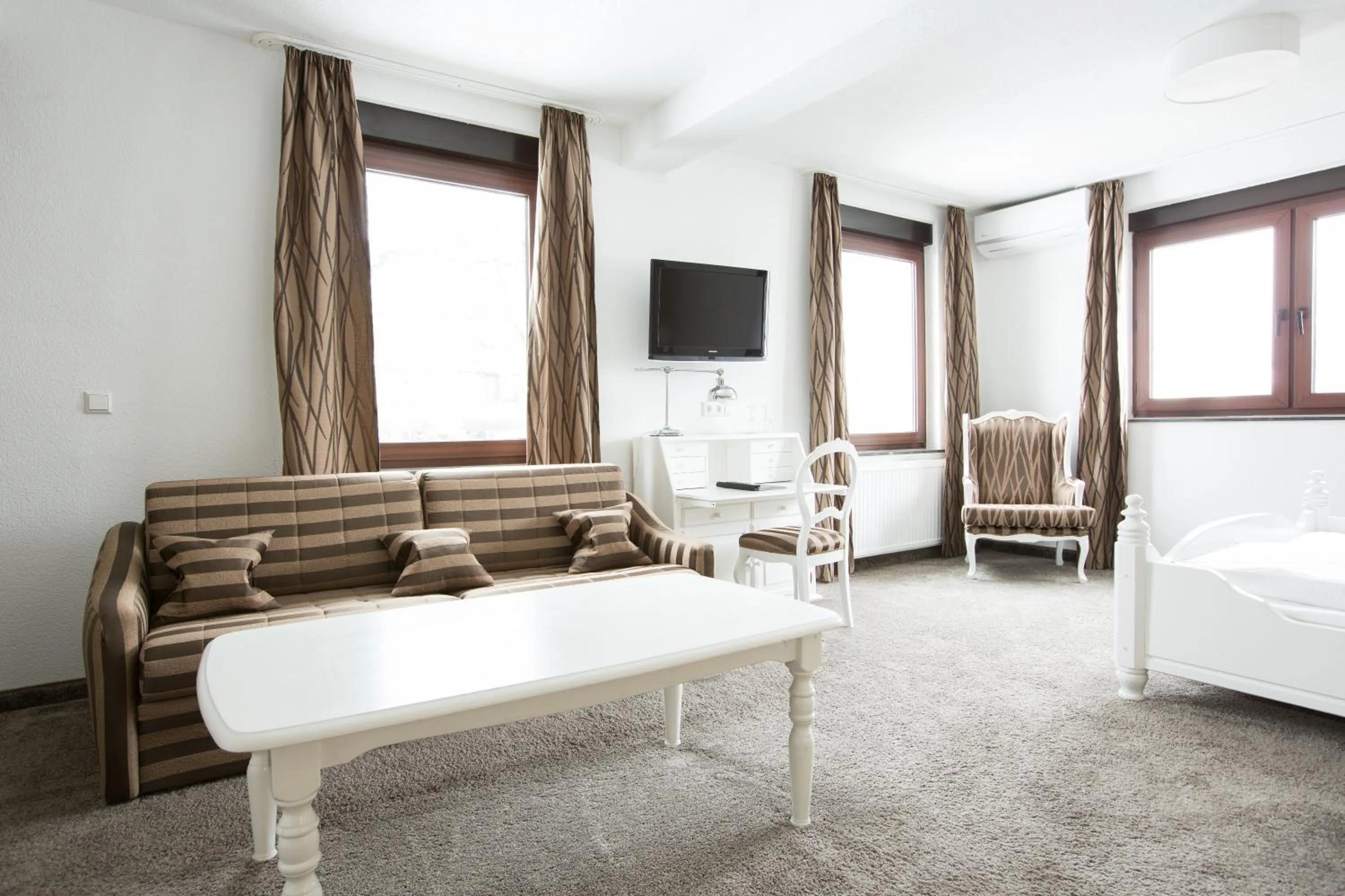 Photo of the whole room, Bed in Boutiquehotel Goldhahn Bio Sport & Wellness