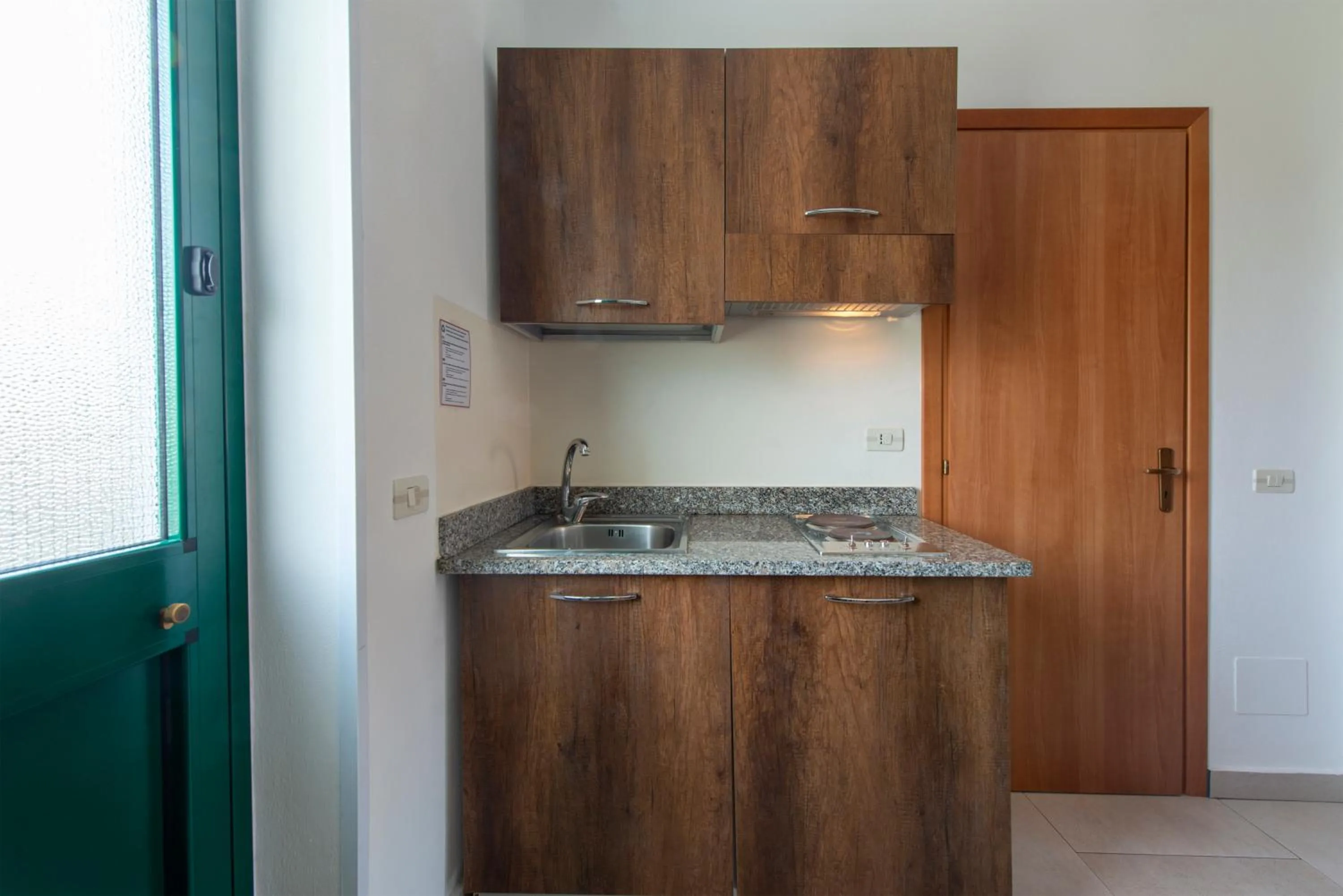 Kitchen or kitchenette in Villaggio Alkantara