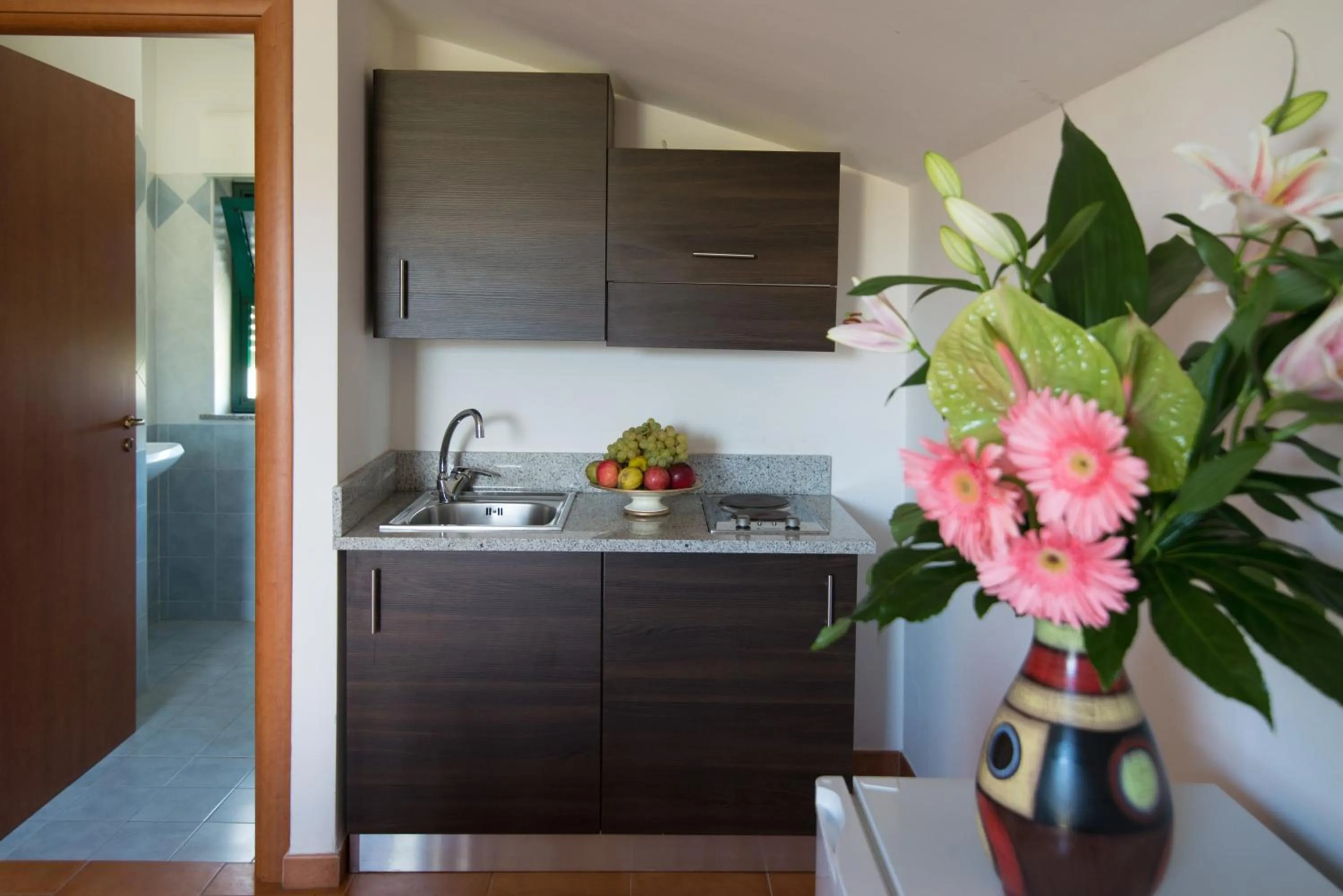 Kitchen or kitchenette in Villaggio Alkantara