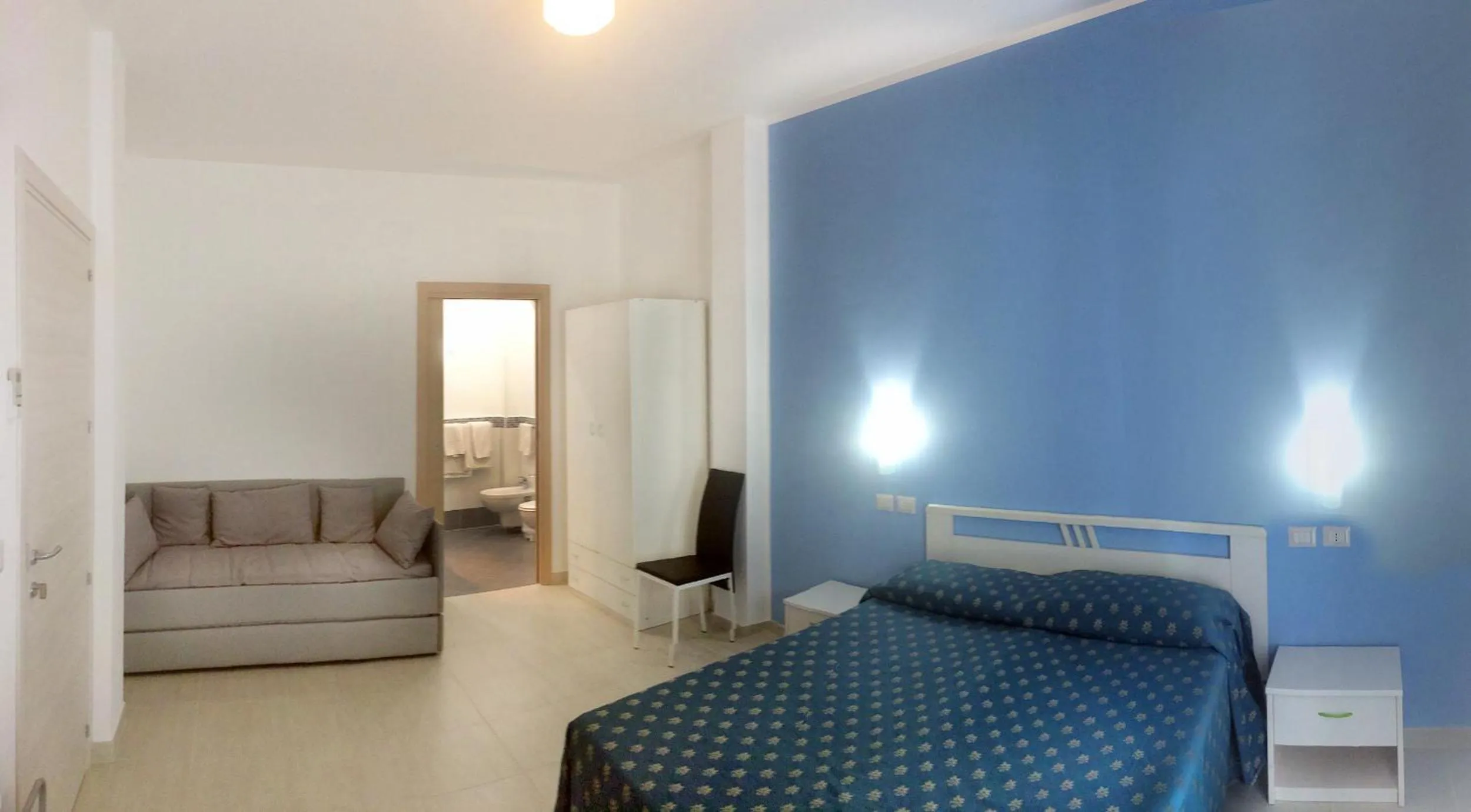 Bed in Maniel Beach Hotel