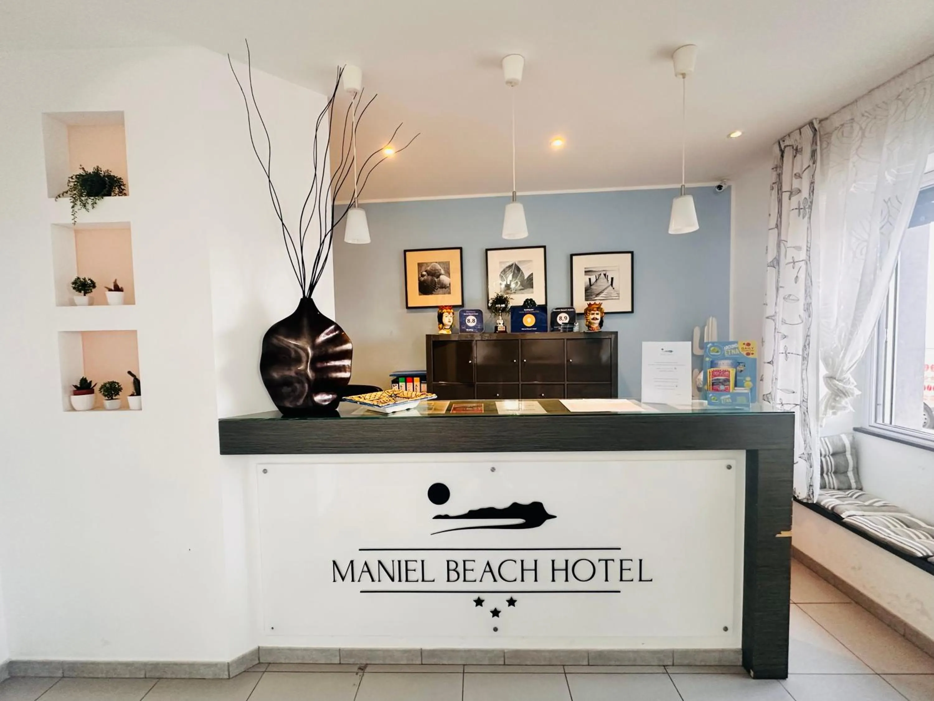 Lobby or reception in Maniel Beach Hotel