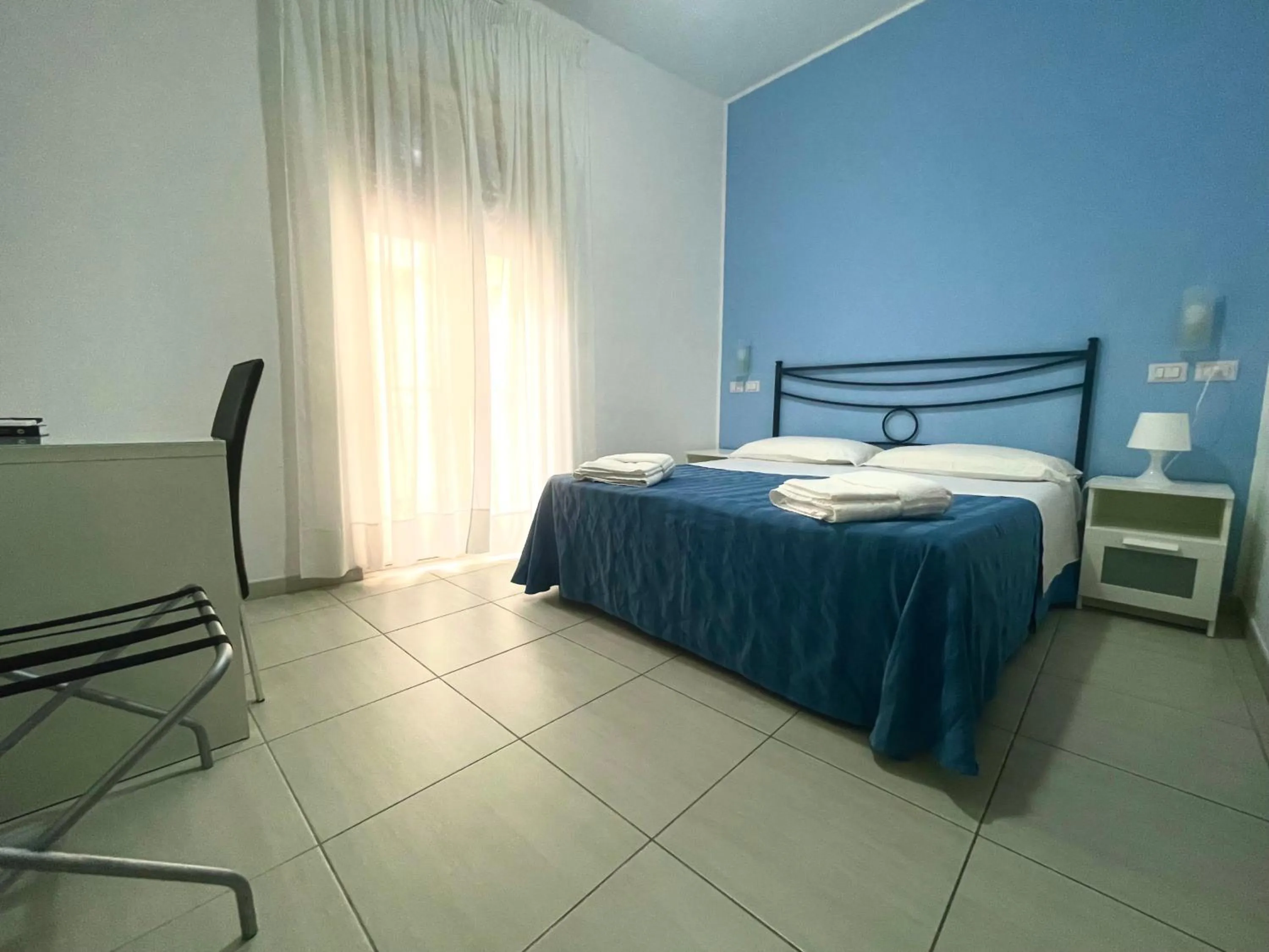 Bed in Maniel Beach Hotel