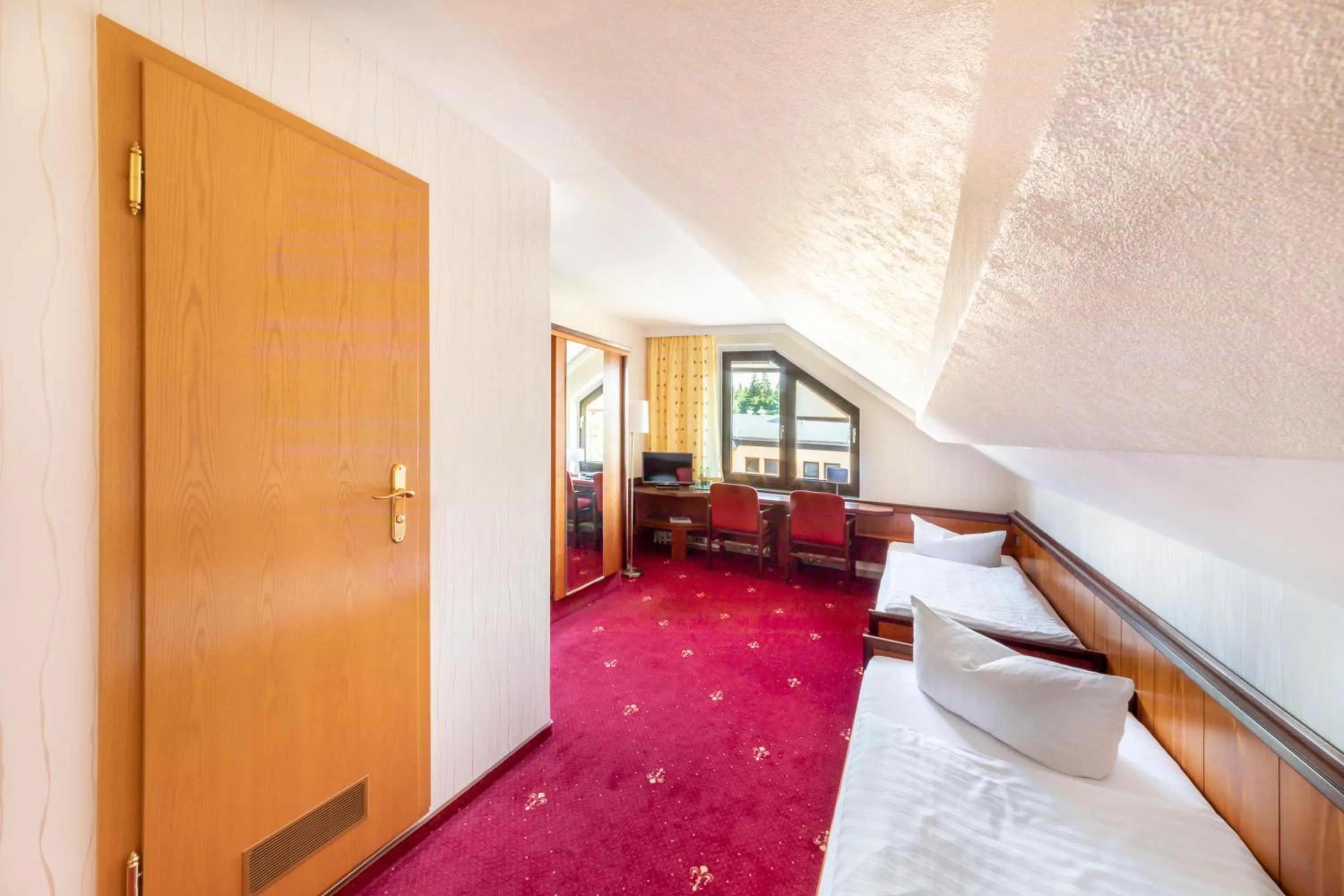 Living room, Bed in Hotel Forstmeister