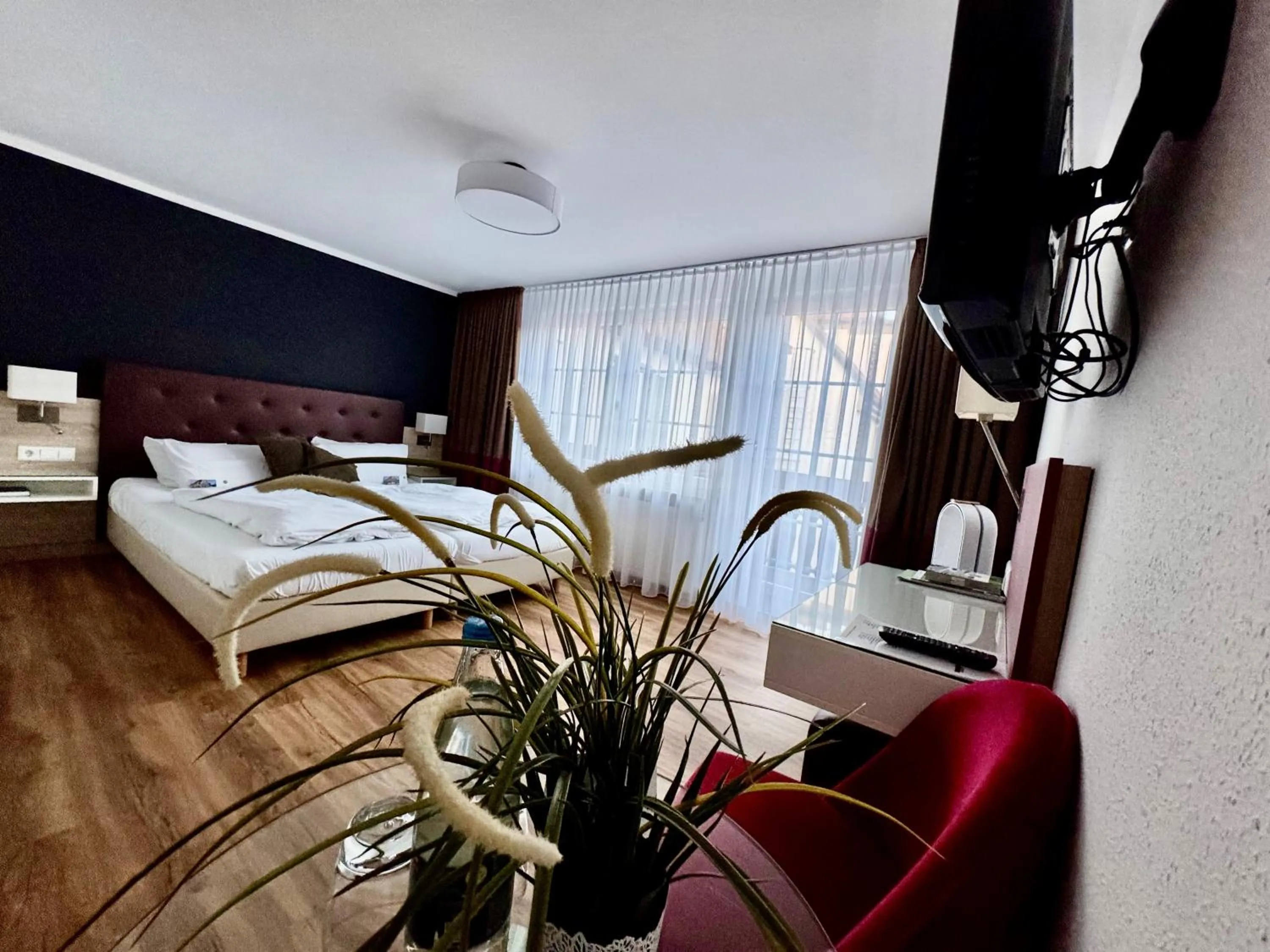 Photo of the whole room, Bed in Flair Hotel Vier Jahreszeiten