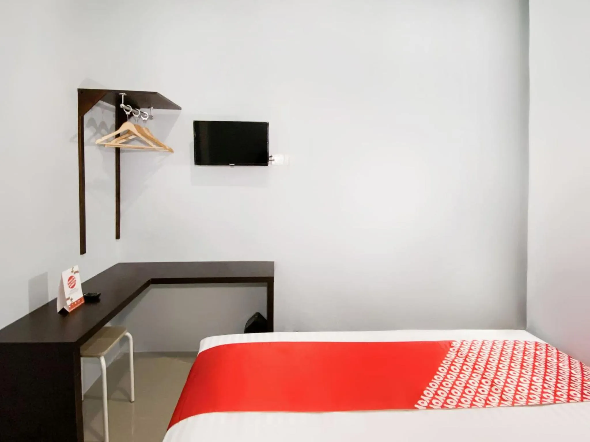 Bedroom in Hotel O Guesthouse Pagi Sore Syariah