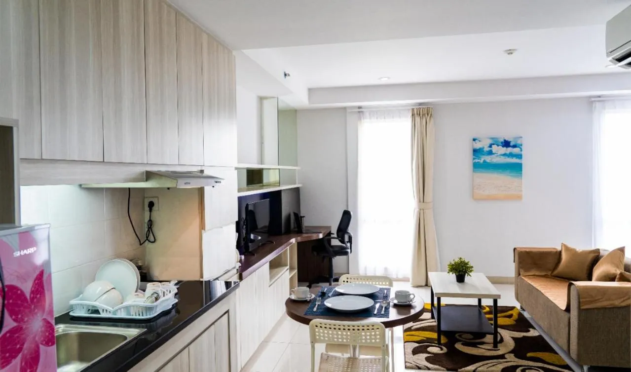 Dining area in Azalea Suites Cikarang by Jayakarta Group