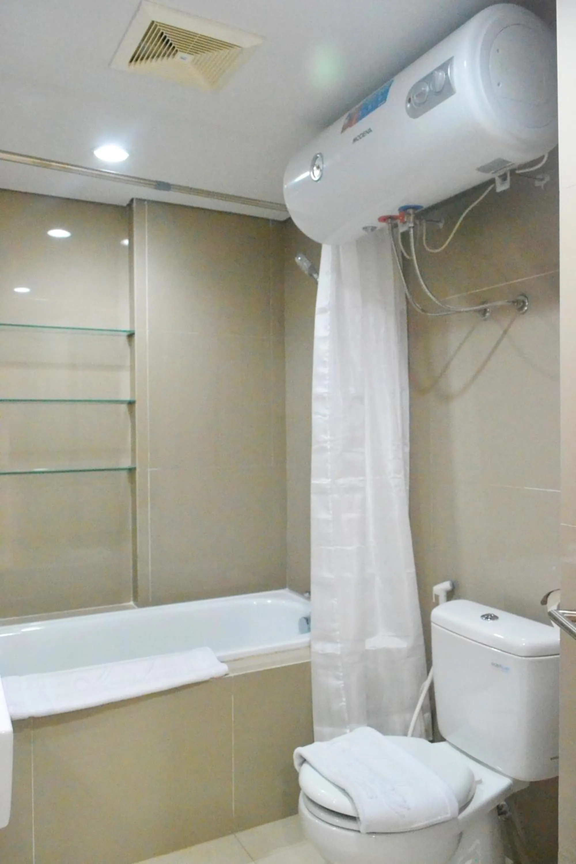 Bathroom in Azalea Suites Cikarang by Jayakarta Group
