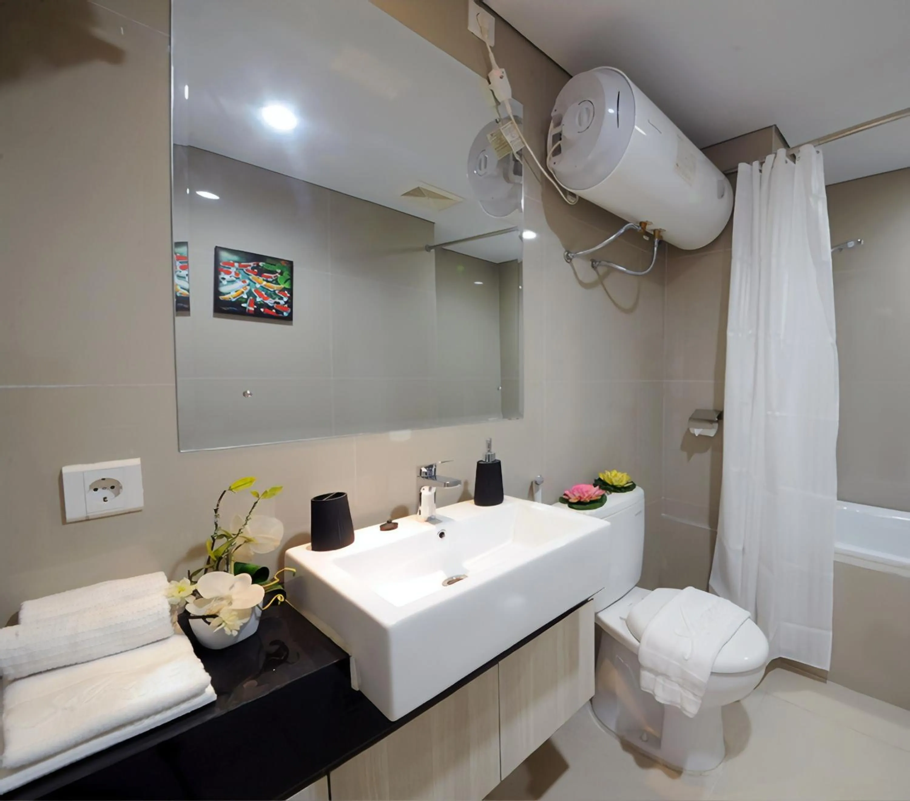 Bathroom in Azalea Suites Cikarang by Jayakarta Group