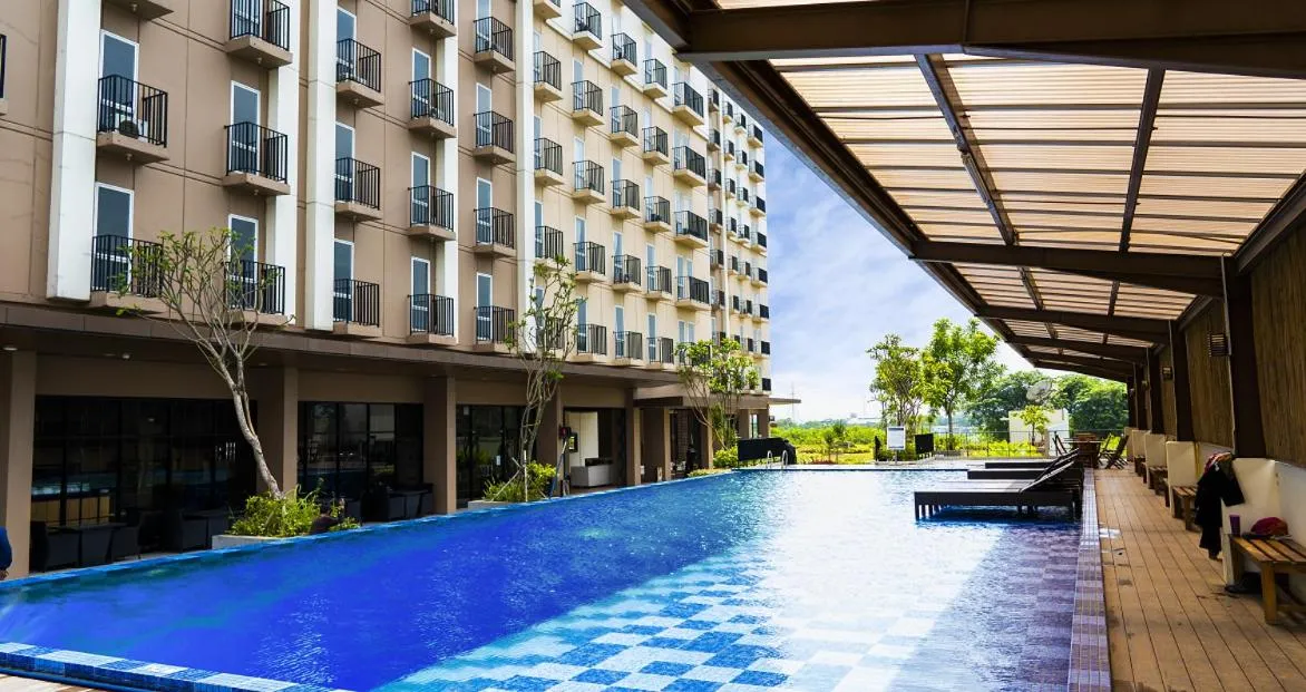 Swimming pool in Azalea Suites Cikarang by Jayakarta Group