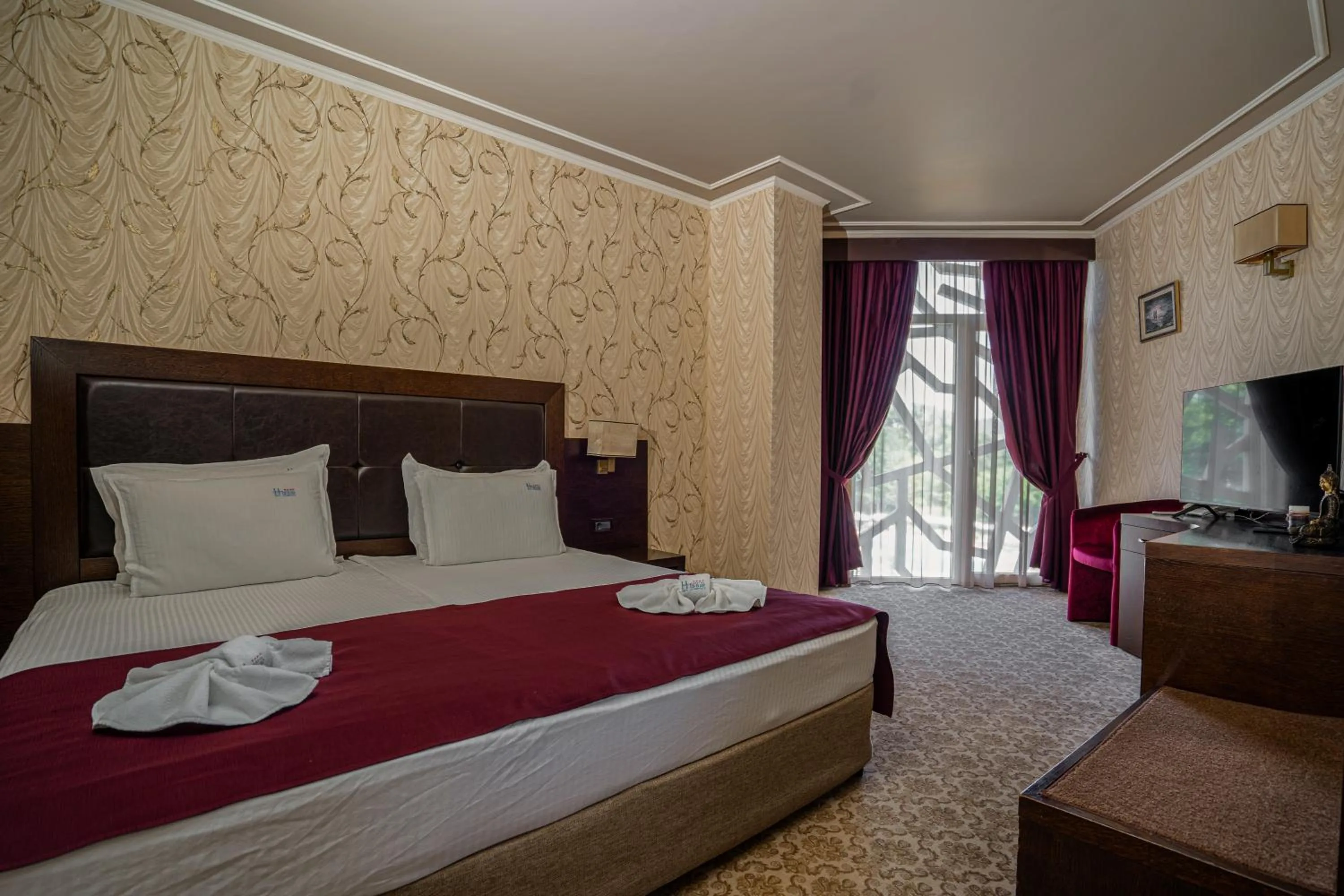 Bed in Hissar Spa Hotel