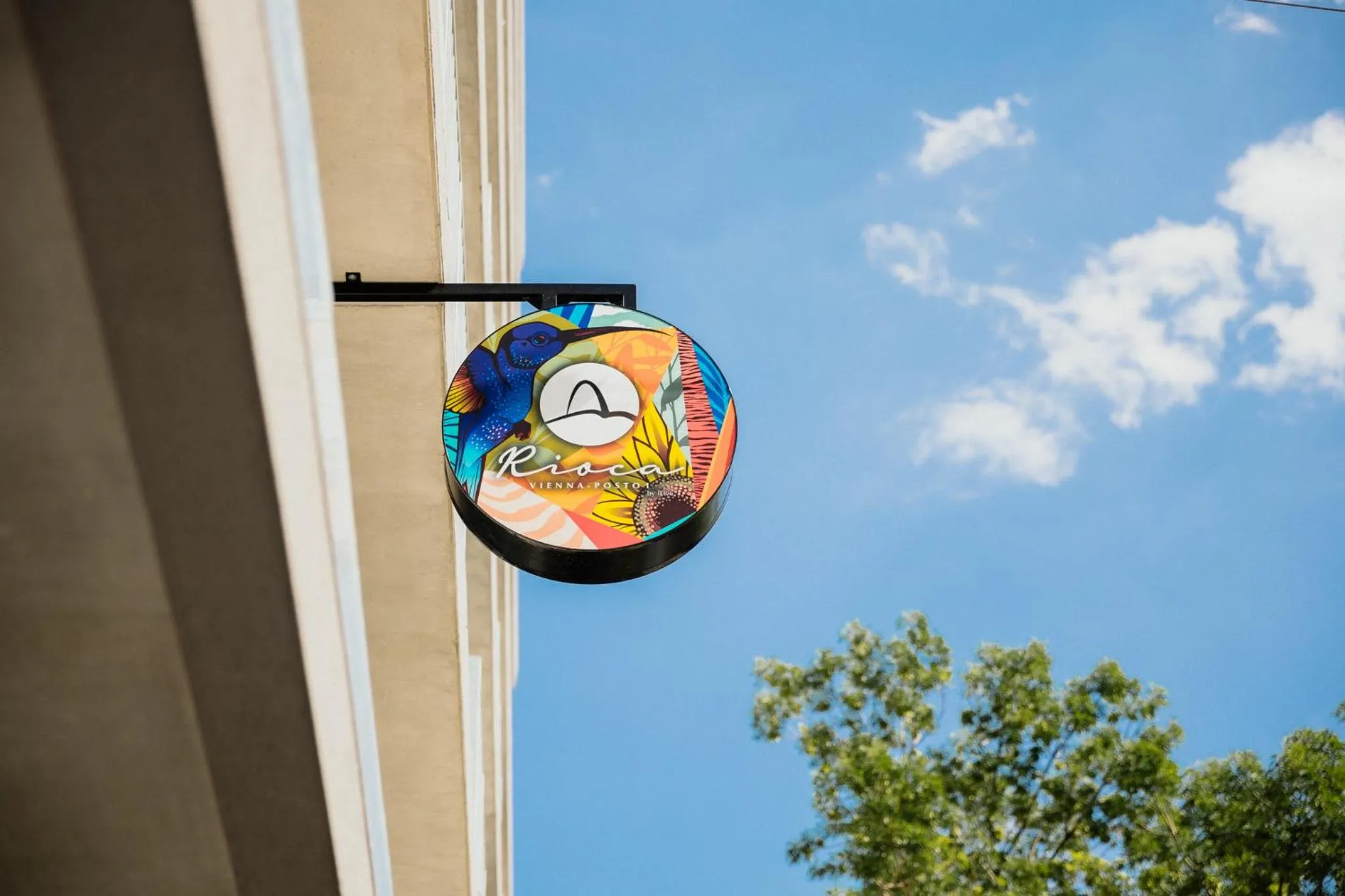 Property logo or sign in Rioca Vienna Posto 1