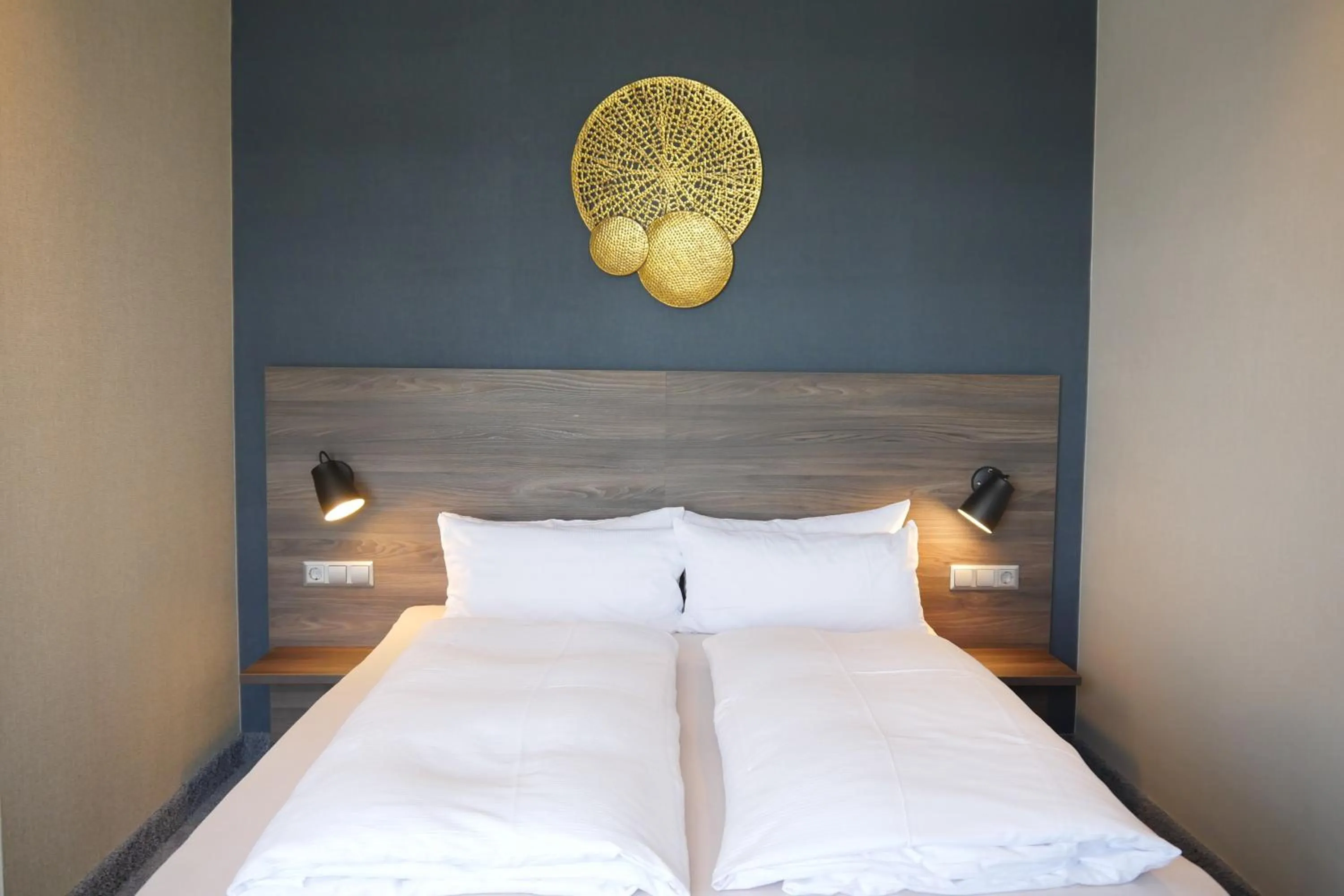 Bed in NaturKulturHotel Stumpf